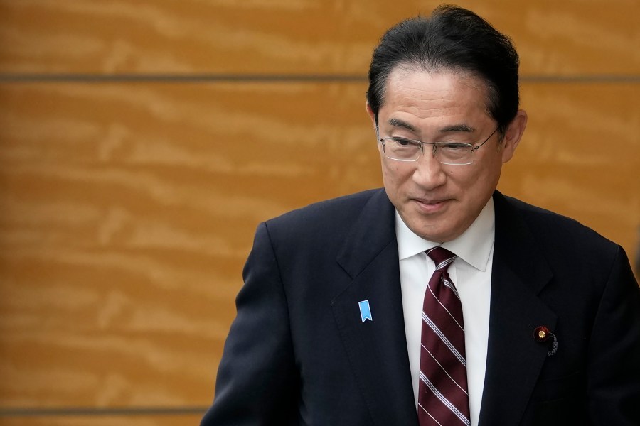 FILE - Japanese Prime Minister Fumio Kishida arrives for a bilateral meeting with Laos' President Thongloun Sisoulith, at the prime ministers's office in Tokyo, on May 25, 2023. Japan approved a major revision to its official development aid policy Friday, June 9, 2023 as the country shifts focus on maritime and economic security and national interests while helping developing nations overcome compound challenges amid China's growing global influence. (AP Photo/Shuji Kajiyama, Pool, File)
