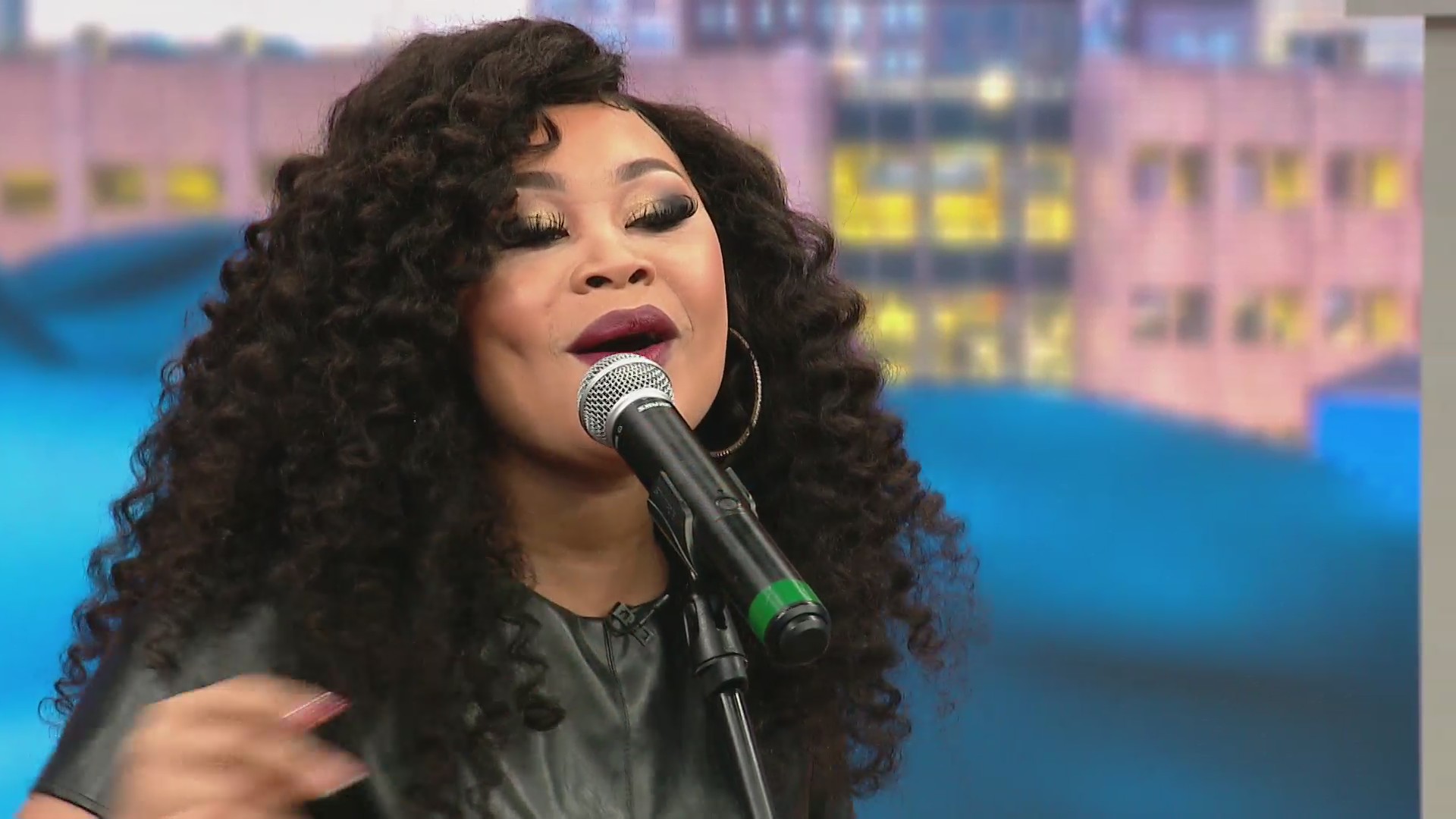 Evvie McKinney sings her Christmas original song