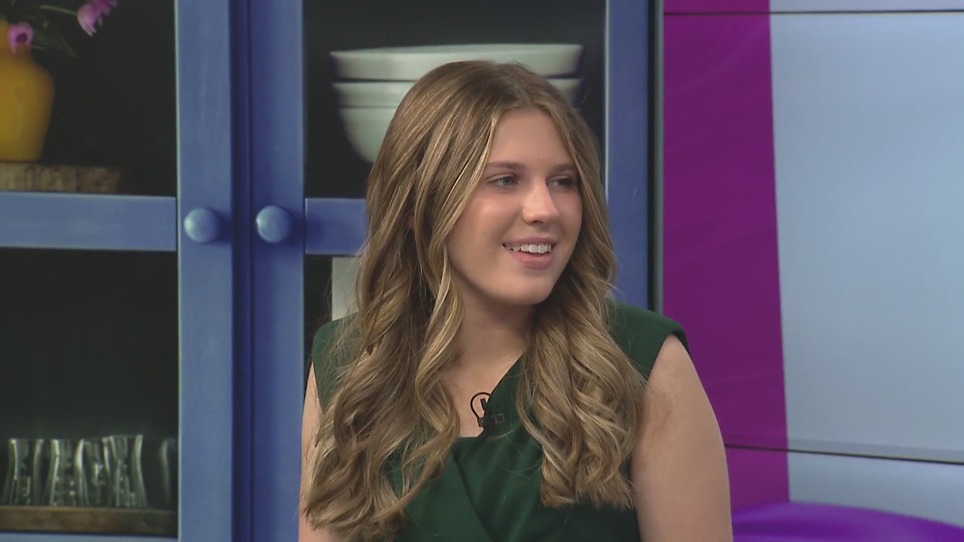 Middle schooler Ella Bork pens and sings a Christmas song to raise money for those in need