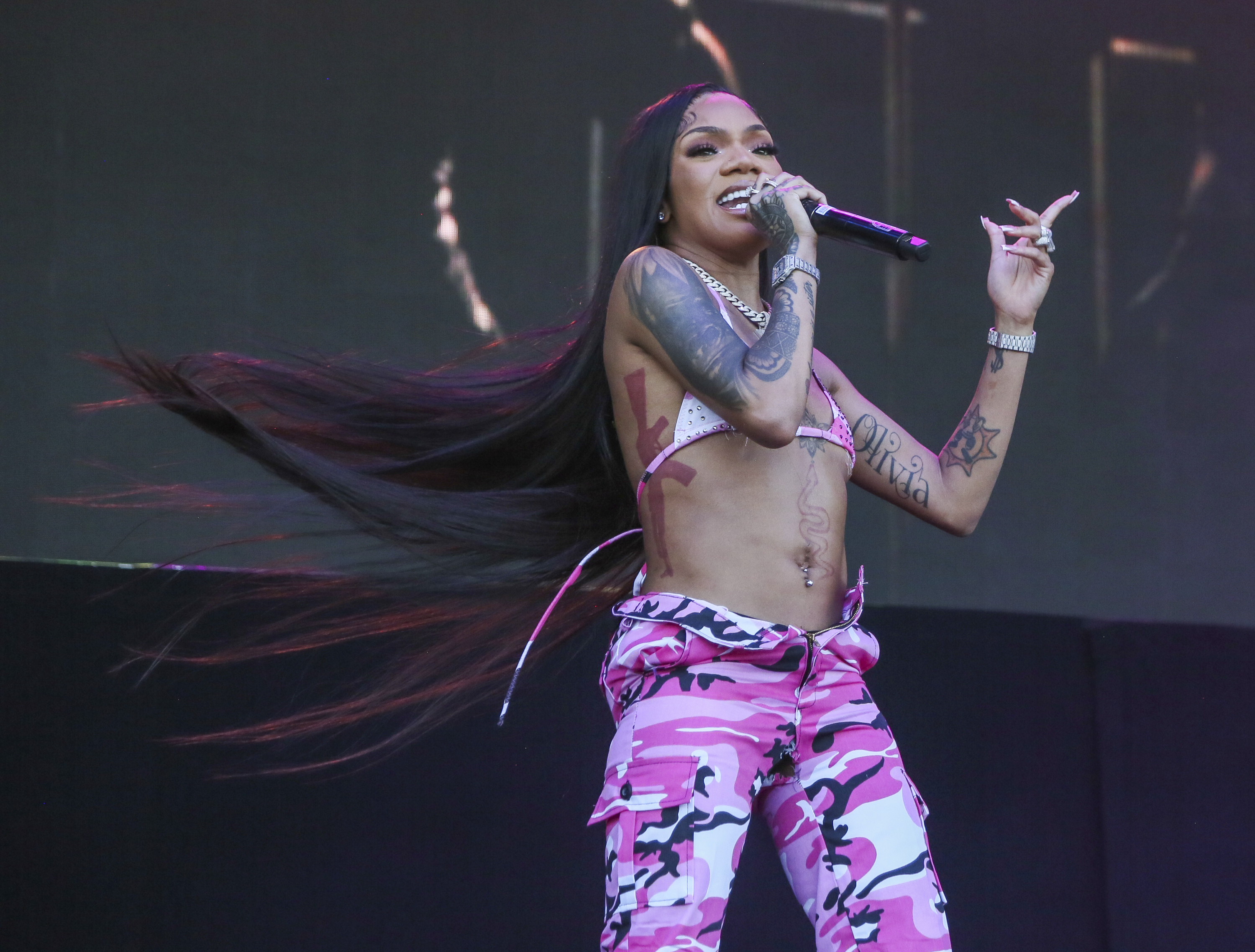 FILE - GloRilla performs during the second weekend of the Austin City Limits Music Festival on Friday, Oct. 13, 2023, at Zilker Park in Austin, Texas. The rap artist known as GloRilla has been charged with drunken driving in Georgia, jail records show. GloRilla, whose real name is Gloria Woods, was charged Tuesday, April 16, 2024, with first-offense driving under the influence of alcohol; having an open container of alcohol; and failing to obey a traffic control device, according to Gwinnett County, Ga., Jail booking records. (Photo by Jack Plunkett/Invision/AP)