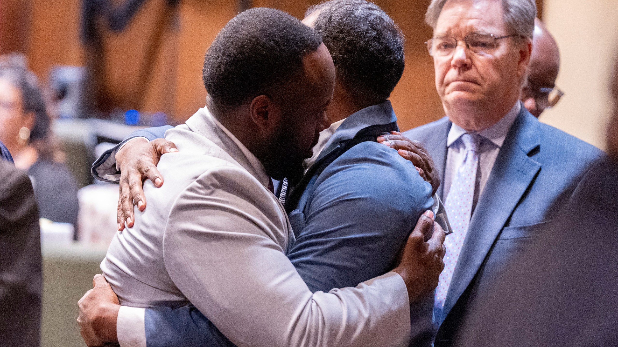 Former Memphis Police Department officers Tadarrius Bean, left, and Justin Smith Jr. hug after they were acquitted of state charges, including second-degree murder, in the fatal beating of Tyre Nichols after he ran away from a traffic stop. Wednesday, May 7, 2025, in Memphis, Tenn. (Chris Day/Commercial Appeal/USA Today Network via AP, Pool)