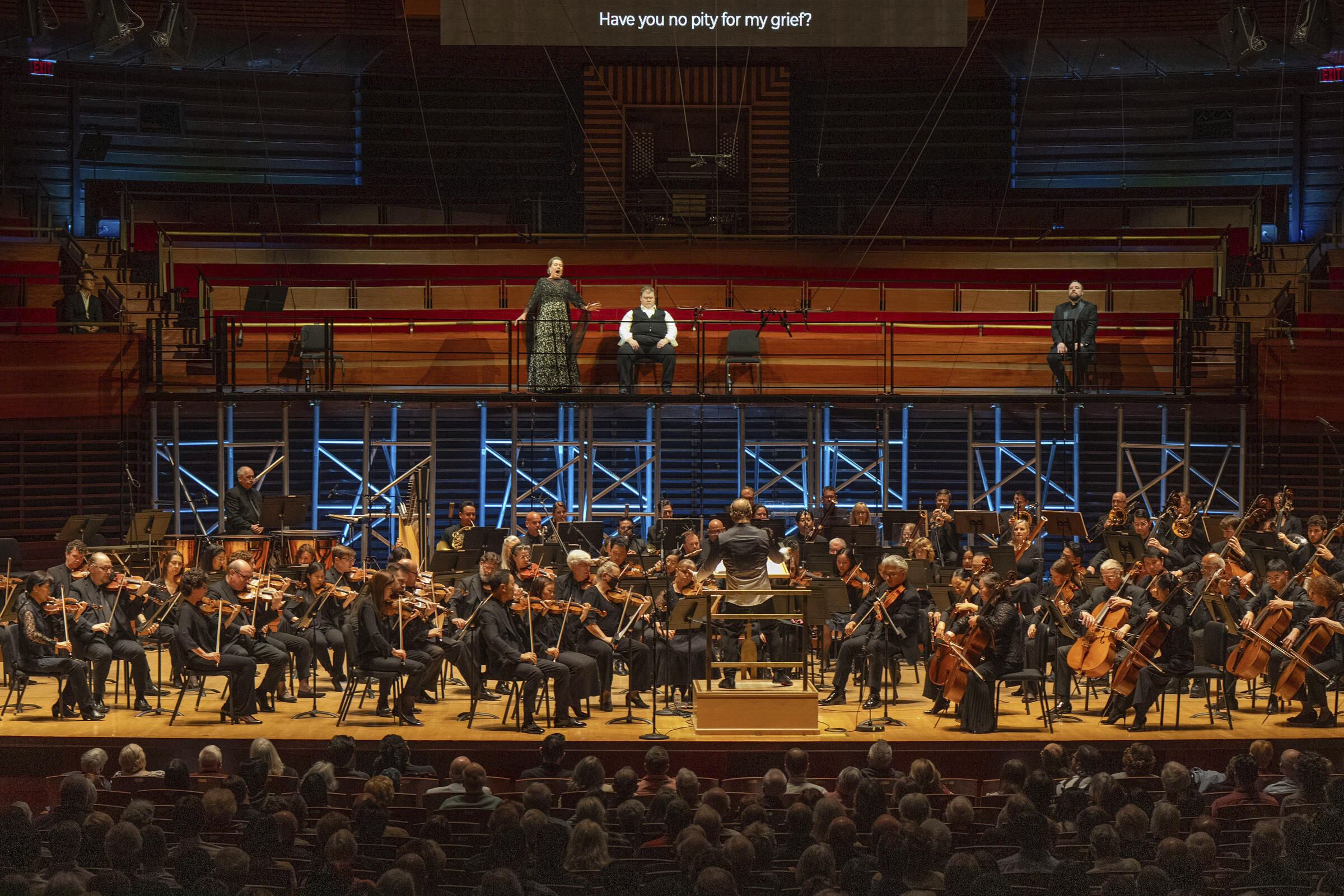This image released by the Philadelphia Opera shows Soprano Nina Stemme, from top left, tenor Stuart Skelton, and baritone Brian Mulligan, with the Philadelphia Orchestra led by music director Yannick Nézet-Séguin, foreground center, during a concert performance of Wagner’s “Tristan und Isolde” at Marian Anderson Hall in Philadelphia on June 1, 2025. (Jessica Griffin/Philadelphia Opera via AP)