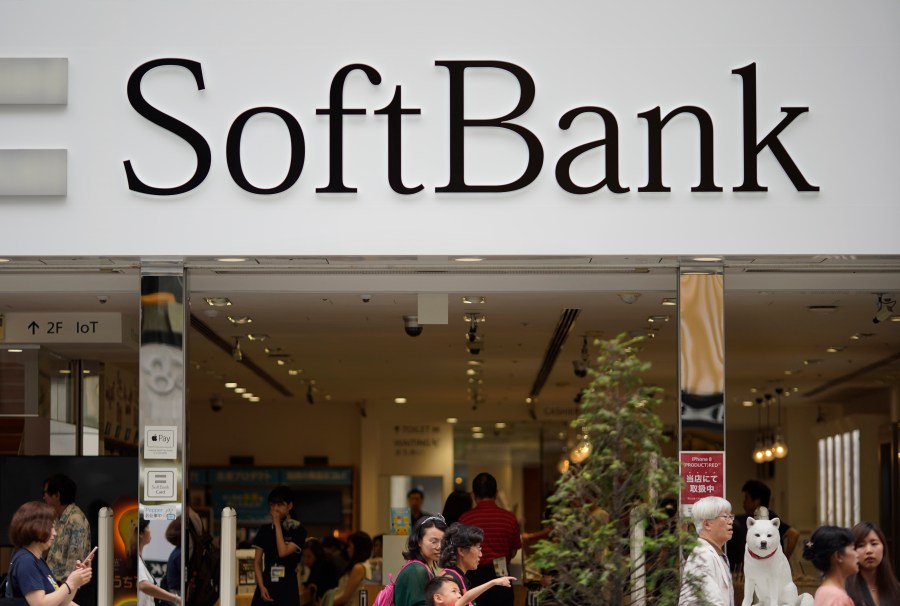 FILE - The logo of Japanese mobile provider SoftBank is seen at its shop in Tokyo on June 14, 2018. (AP Photo/Shuji Kajiyama, File)