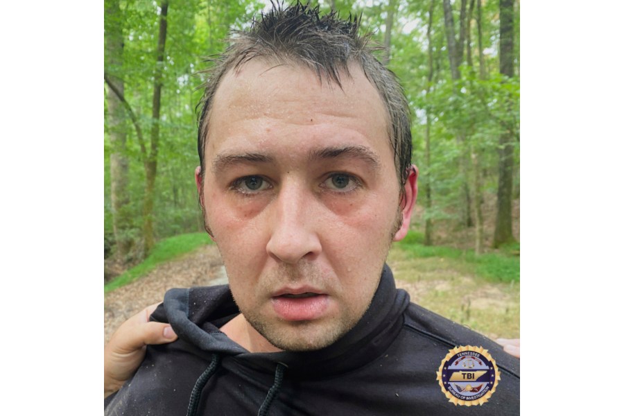 This photo provided by Tennessee Bureau of Investigation on Tuesday, Aug. 5, 2025 shows Austin Drummond, moments after having been taken into custody. (Tennessee Bureau of Investigation via AP)