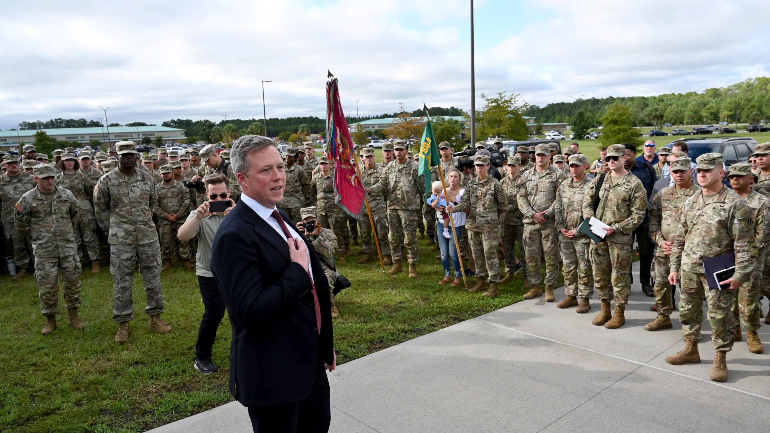 Army Secretary Dan Driscoll expresses his gratitude as he arrives to honor six soldiers for their heroic actions and for a news conference outside Fort Stewart in Georgia, Thursday, Aug. 6, 2025. (Hyosub Shin /Atlanta Journal-Constitution via AP)