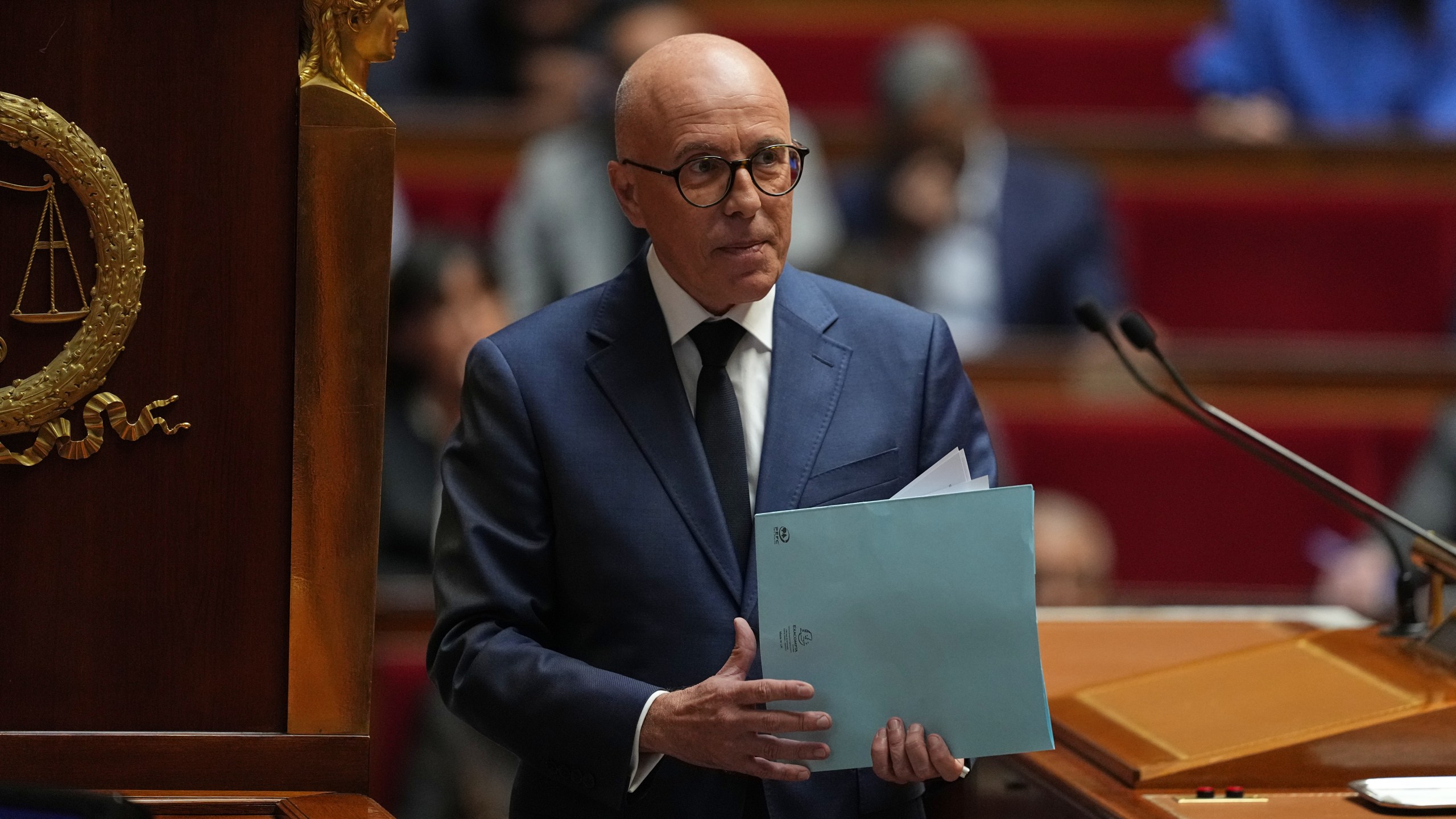 Eric Ciotti, a conservative lawmaker and ally to far-right National Rally party, leaves after his speech before a no-confidence vote, Thursday, Oct. 16, 2025 at the National Assembly in Paris. (AP Photo/Thibault Camus)