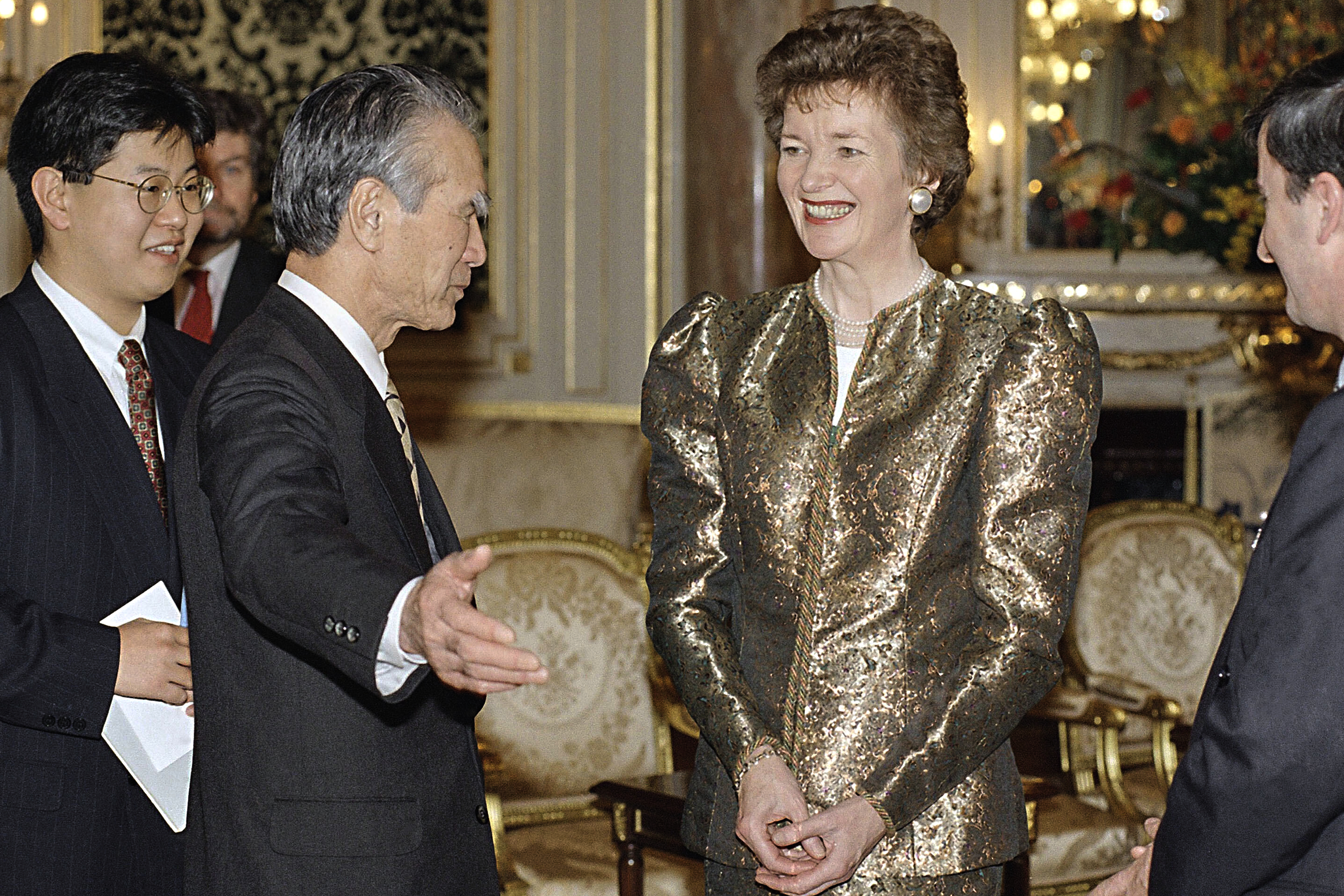 FILE - Irish President Mary Robinson, right, smiles at Japans Prime Minister Tomiichi Murayama, center left, prior to the dinner at the Akasaka Palace, Feb. 23, 1995, Tokyo, Japan. (AP Photo/Shizuo Kambayashi, File)