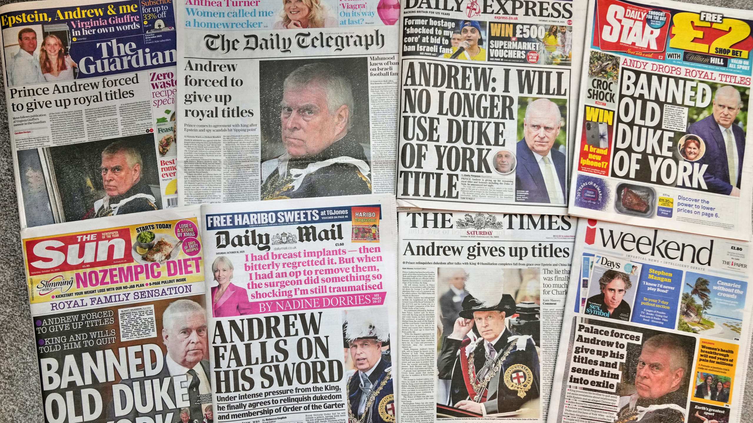 A selection of British national newspapers showing the front pages and their reaction to Prince Andrew announcing that he will relinquish his Duke of York title and the Order of the Garter, amid ongoing problems in his personal life, in London, Saturday, Oct. 18, 2025. (AP Photo/Alastair Grant)