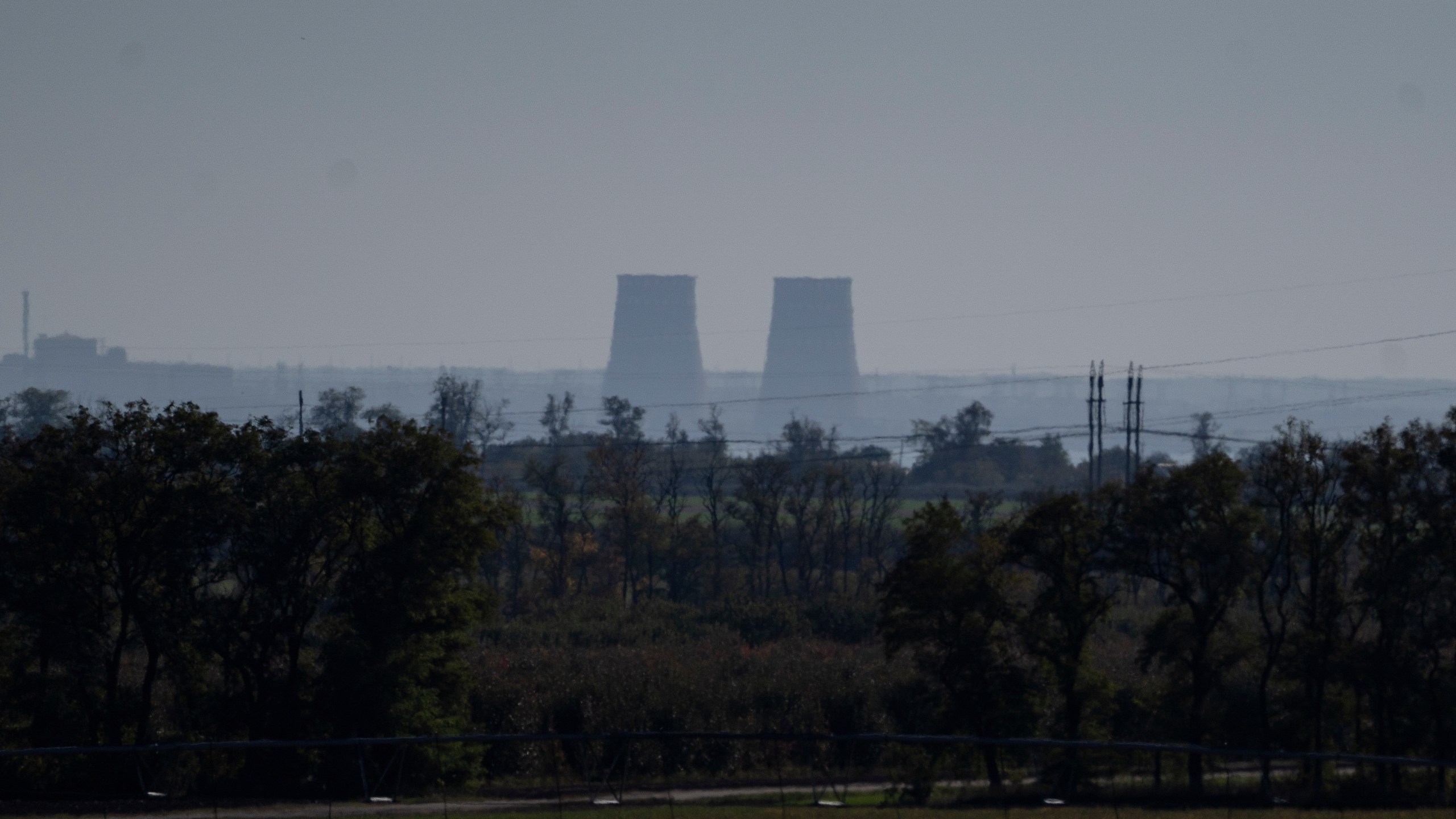 FILE - Zaporizhzhia nuclear power plant is seen from around twenty kilometers away in an area in the Dnipropetrovsk region, Ukraine, Monday, Oct. 17, 2022. (AP Photo/Leo Correa, File)