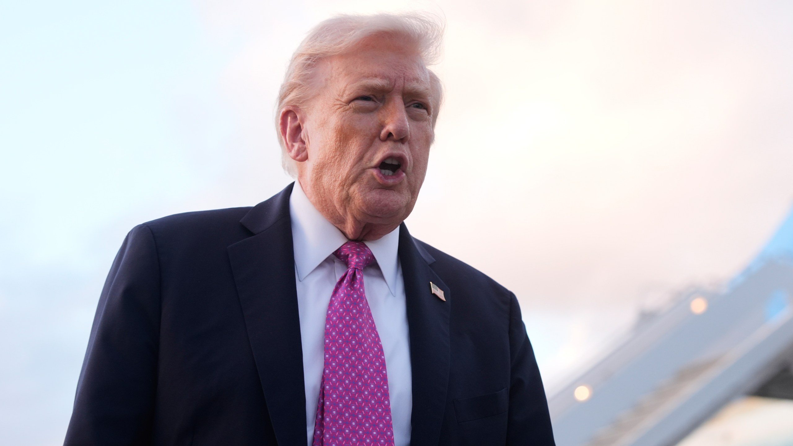 President Donald Trump speaks to reporters after arriving on Air Force One, Friday, Oct. 17, 2025, at Palm Beach International Airport in West Palm Beach, Fla. (AP Photo/Mark Schiefelbein)