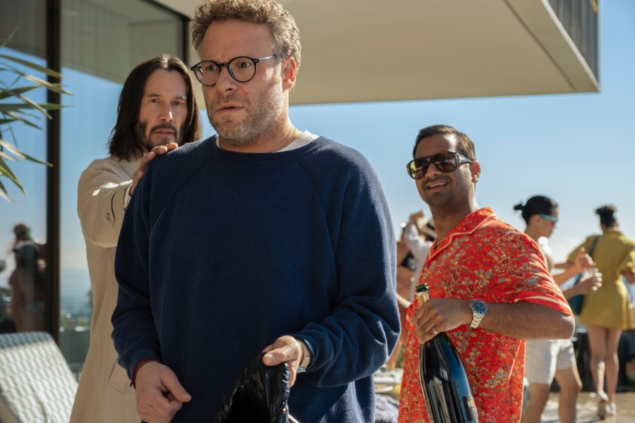 This image released by Lionsgate shows Keanu Reeves, from left, Seth Rogen and Aziz Ansari in a scene from "Good Fortune." (Eddy Chen/Lionsgate via AP)
