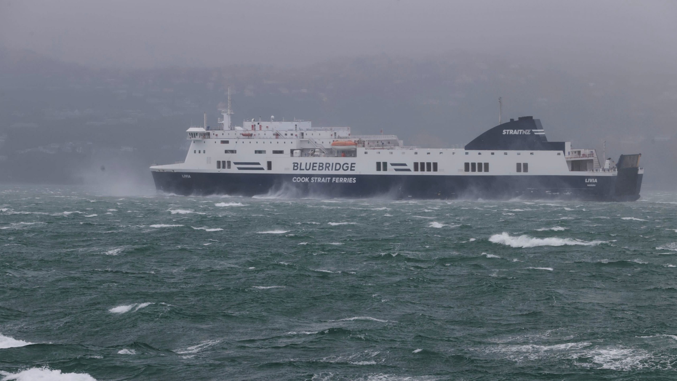 A ferry is battered by high winds in Wellington, New Zealand, Tuesday, Oct. 21, 2025. (Bruce MacKay/STUFF via AP)