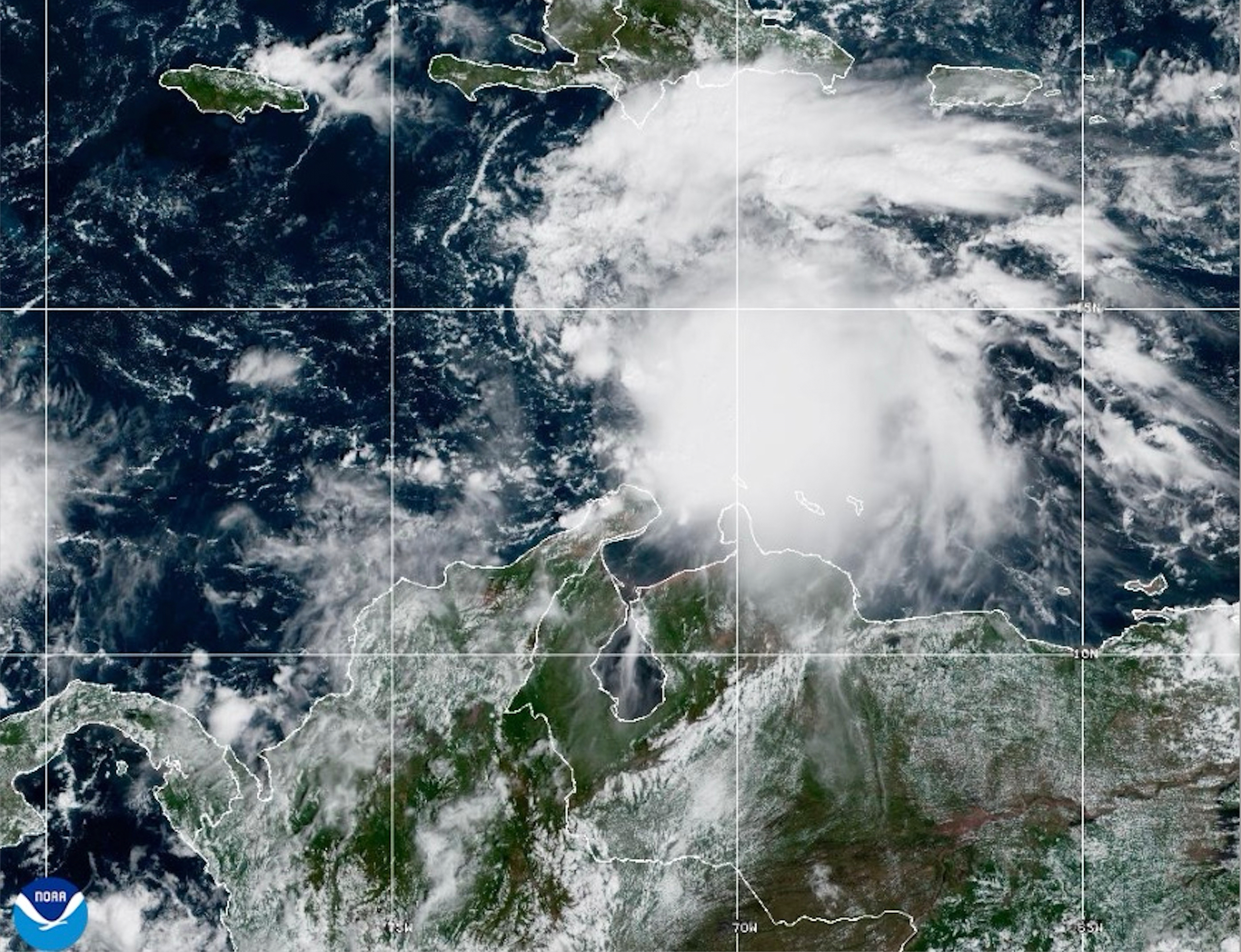 This NOAA satellite image taken at 11:40 a.m. EST on Tuesday, Oct. 21, 2025, shows Tropical Storm Melissa in the Central Caribbean Sea. (NOAA via AP)