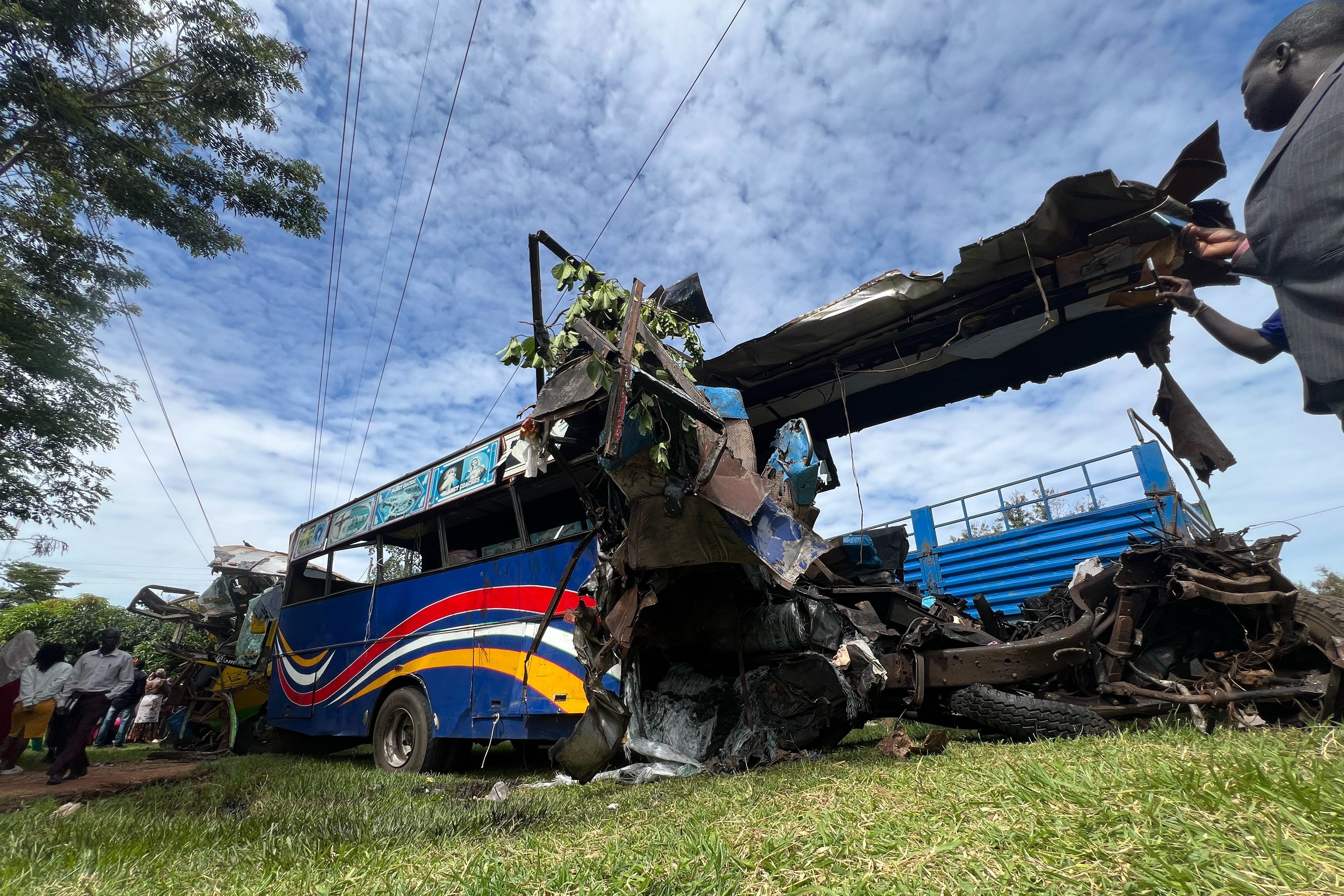 A bus involved in a highway collision that left dozens dead near Gulu, northern Uganda, on Wednesday,Oct. 22, 2025. (AP Photo/ Hakiim Wampamba)