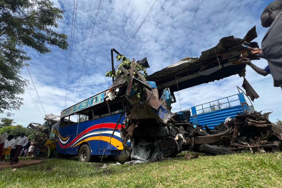 A bus involved in a highway collision that left dozens dead near Gulu, northern Uganda, on Wednesday,Oct. 22, 2025. (AP Photo/ Hakiim Wampamba)