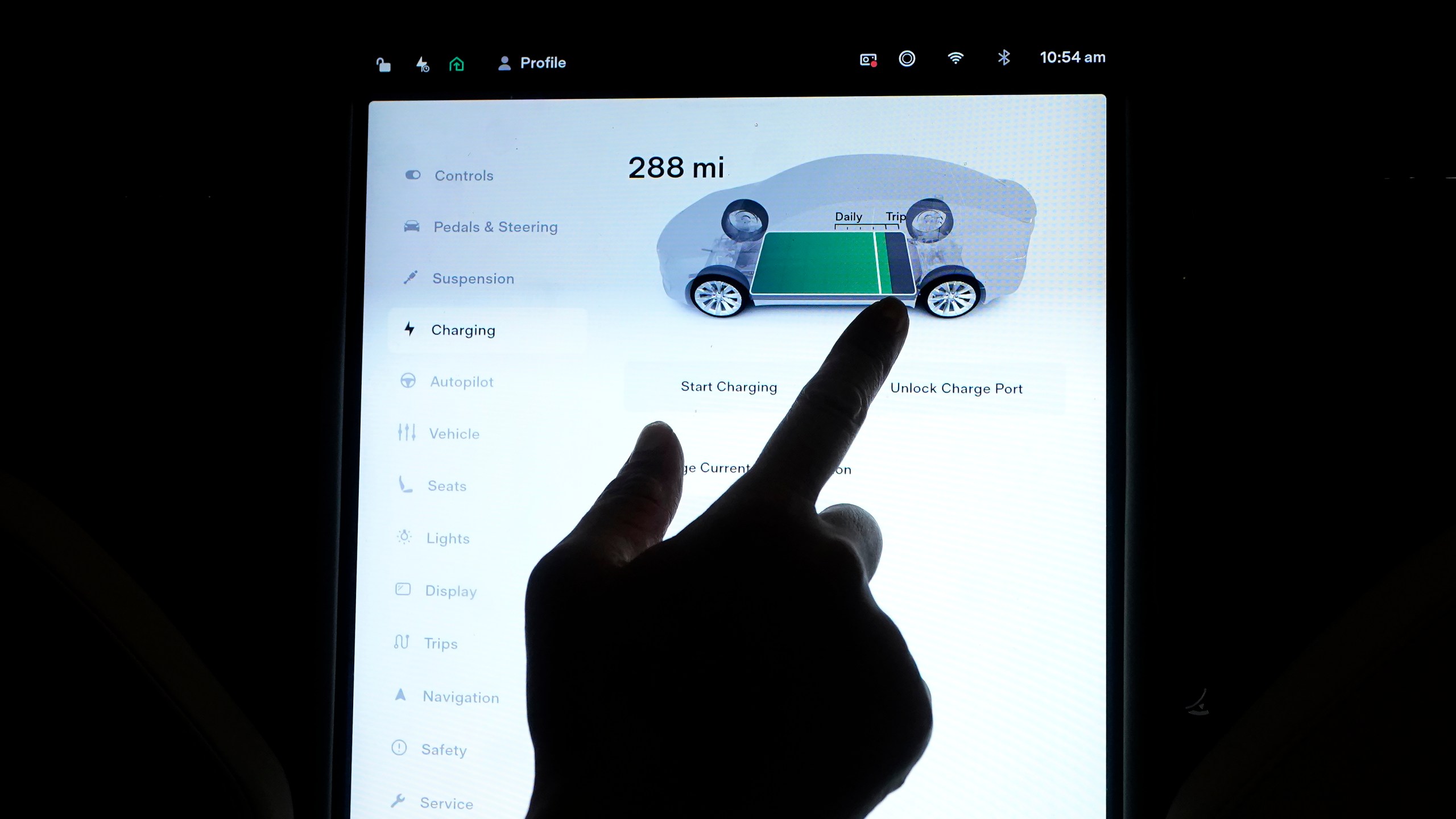FILE - The charging status screen is shown on a Tesla car at a home in San Francisco, Aug. 25, 2022. (AP Photo/Jeff Chiu, File)