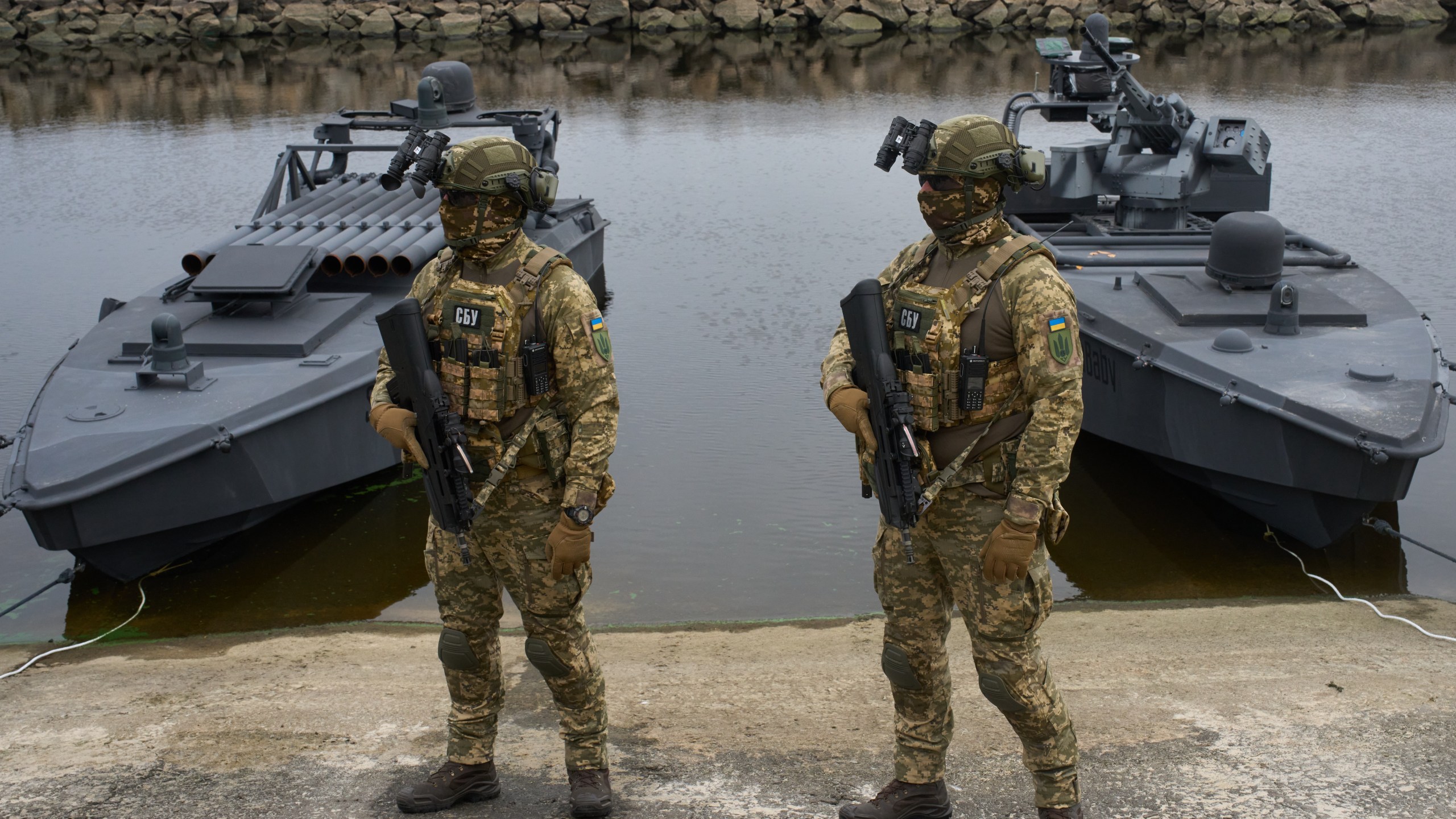 Ukraine's Security Service officers stand by Sea Baby drones, during a demonstration at an undisclosed location in Ukraine Friday, Oct. 17, 2025. (AP Photo/Efrem Lukatsky)