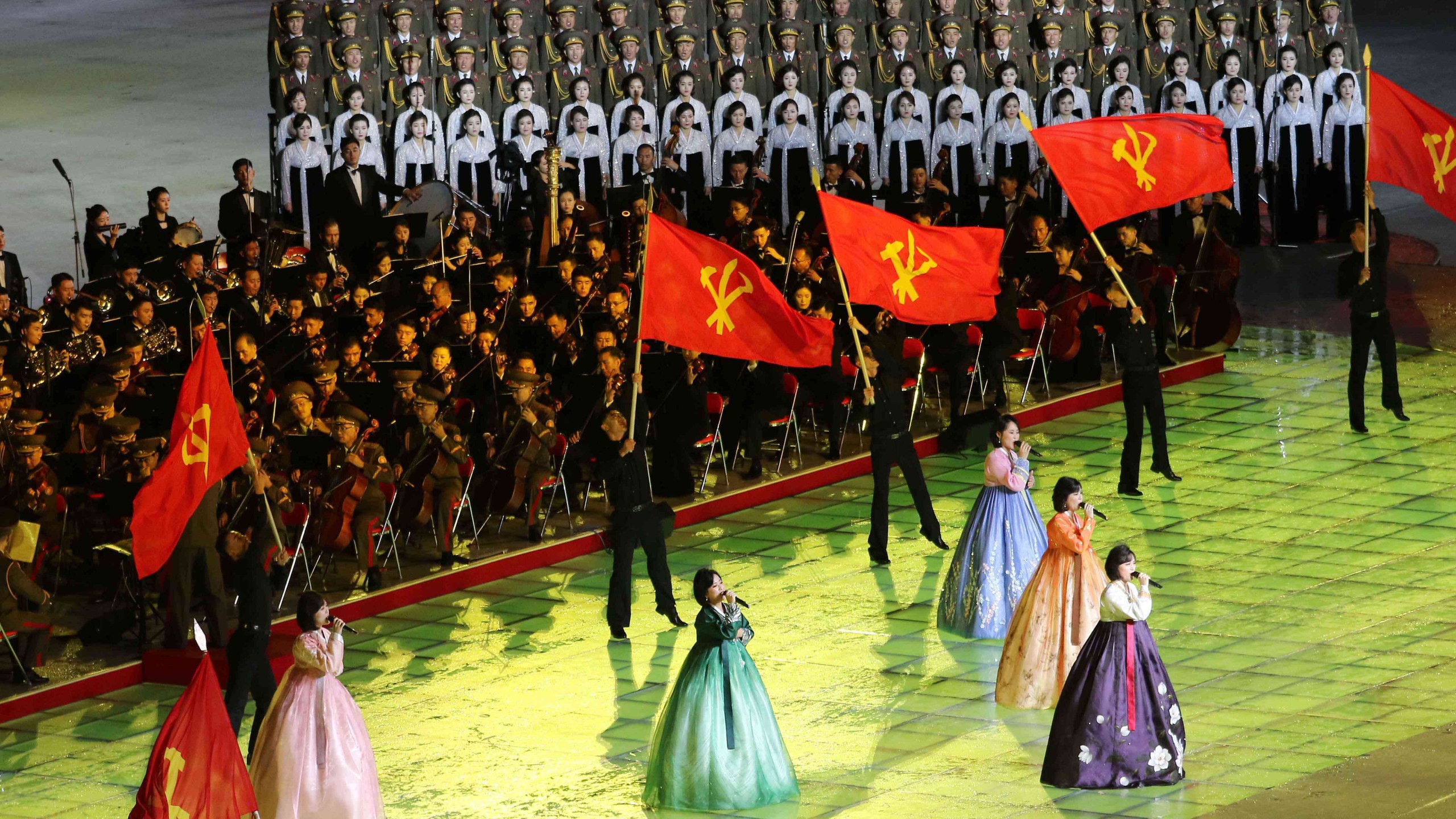 People perform during the ceremony marking the 80th anniversary of the founding of the ruling Workers' Party at the May Day Stadium in Pyongyang, North Korea, Thursday, Oct. 9, 2025. (AP Photo/Jon Chol Jin)
