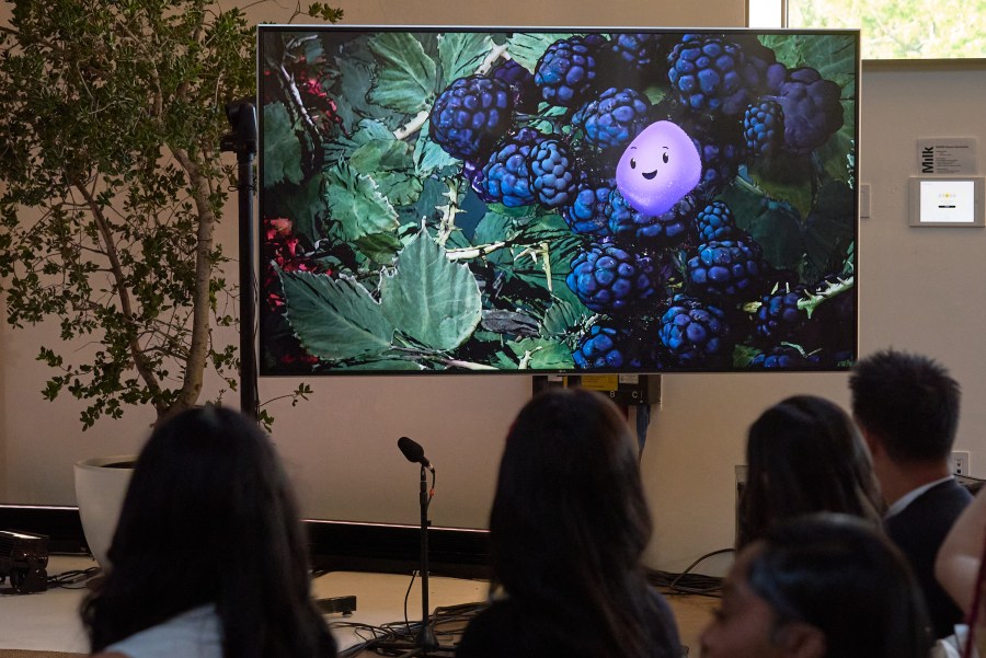 A video animation shows a Copilot Appearance avatar called Mico, floating around an abstract environment during a presentation at Microsoft's Fall 2025 Copilot Sessions event on Wednesday, Oct. 22, 2025, in Los Angeles. (AP Photo/Damian Dovarganes)