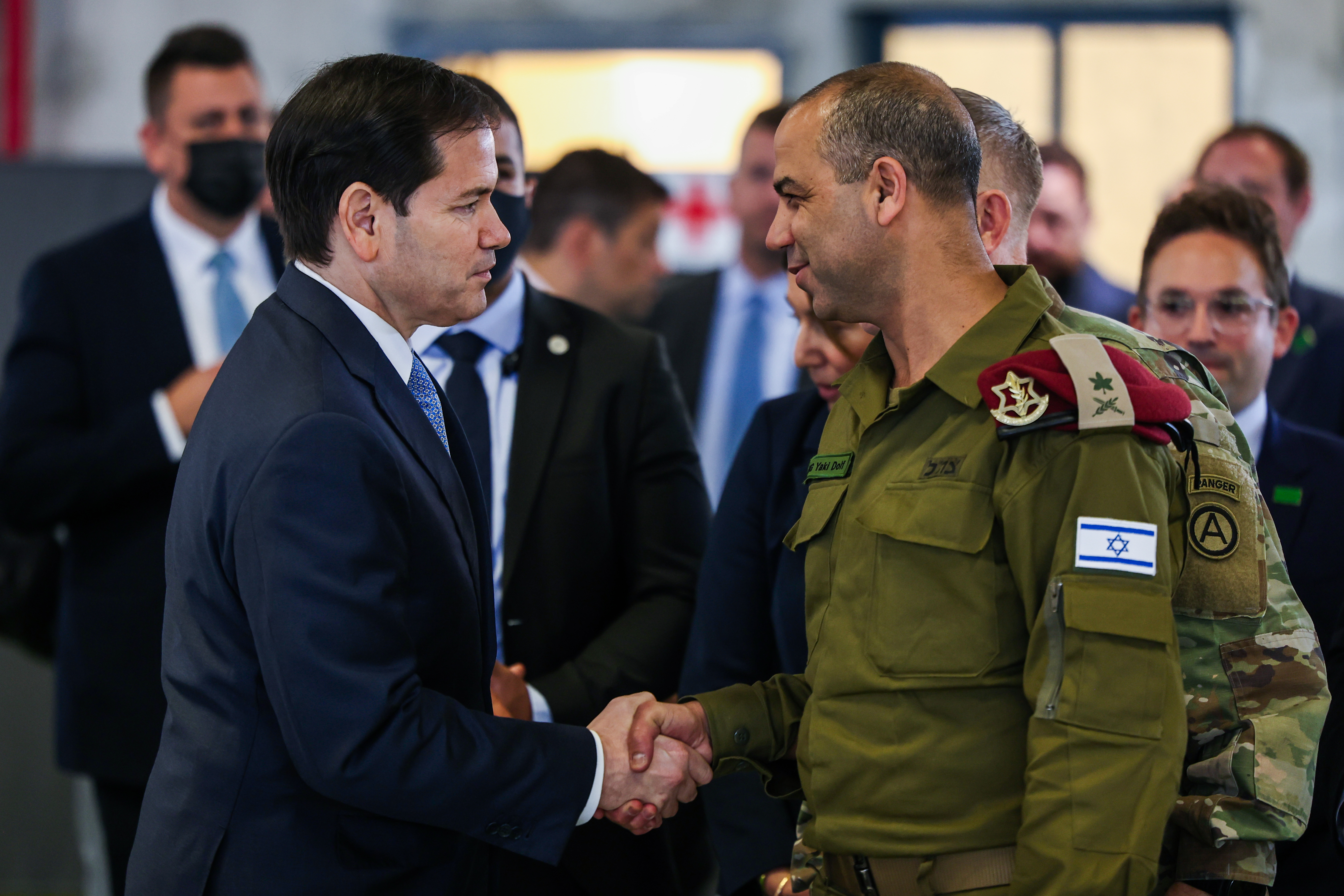 US Secretary of State Marco Rubio speaks with Israeli Brigadier General Yaakov Dolf as he visits the Civil-Military Coordination Center in Southern Israel, Friday, Oct. 24, 2025. (Fadel Senna/Pool Photo via AP)