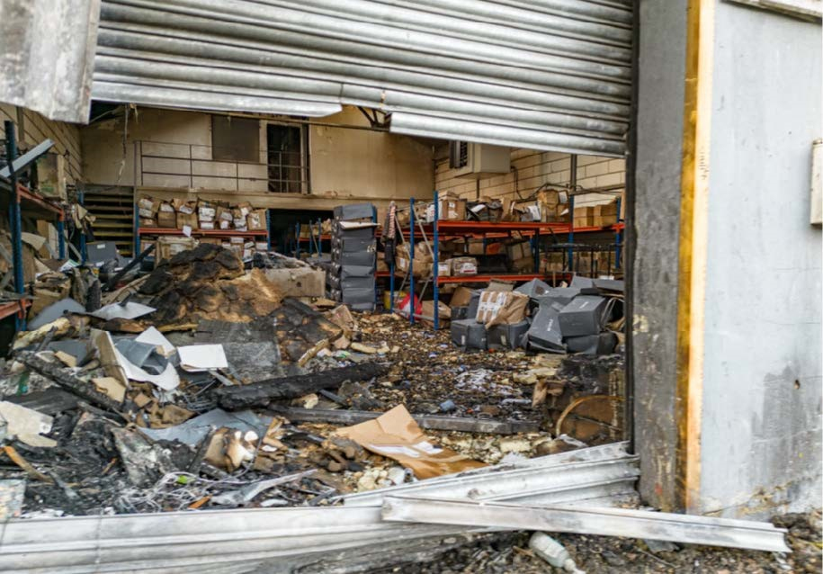 Undated handout photo issued by the Metropolitan Police of the damage to an east London warehouse. (Metropolitan Police via AP)