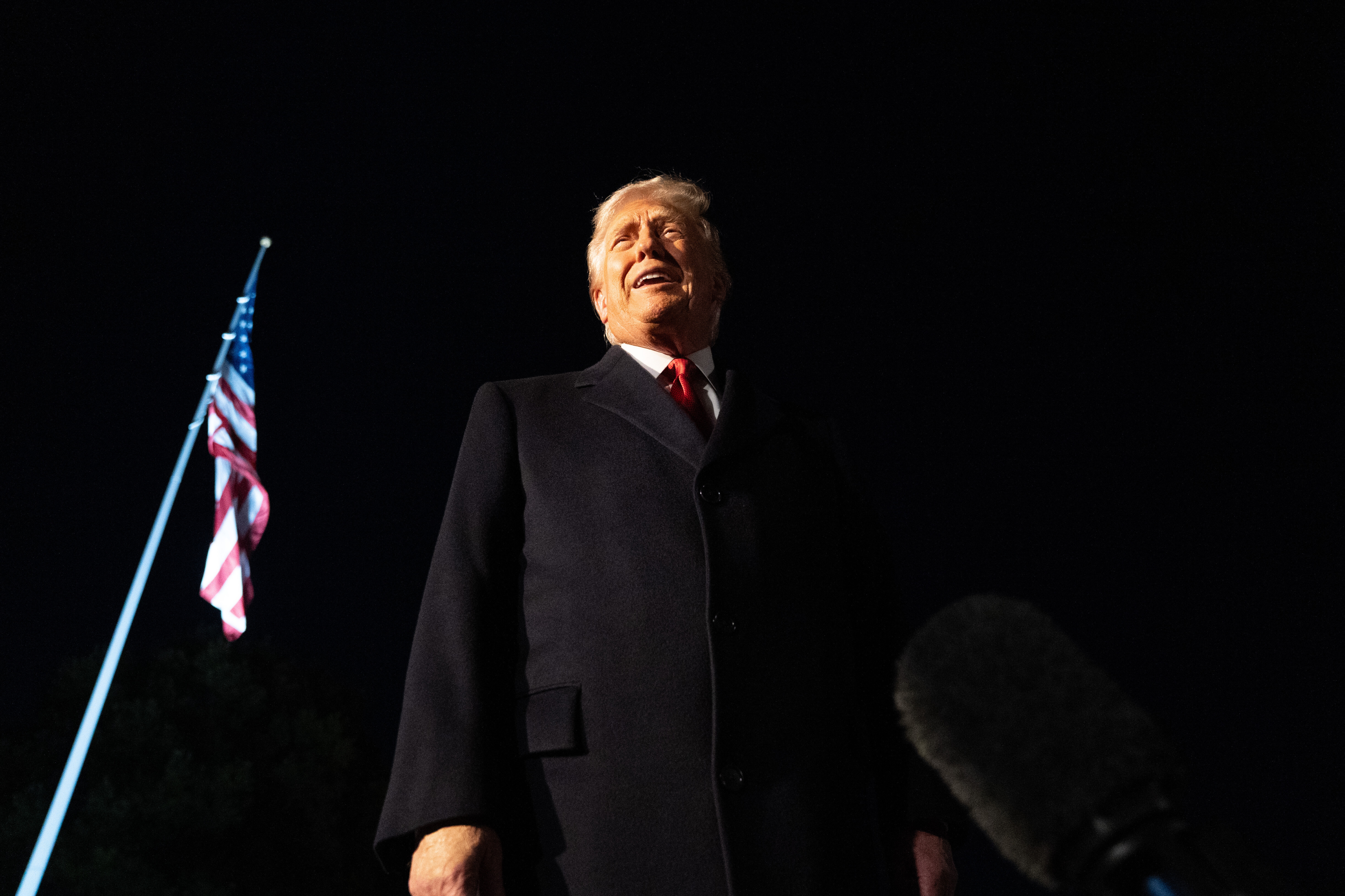 President Donald Trump talks to reporters as he departs the White House, Friday, Oct. 24, 2025, in Washington, for a trip to Asia. (AP Photo/Allison Robbert)