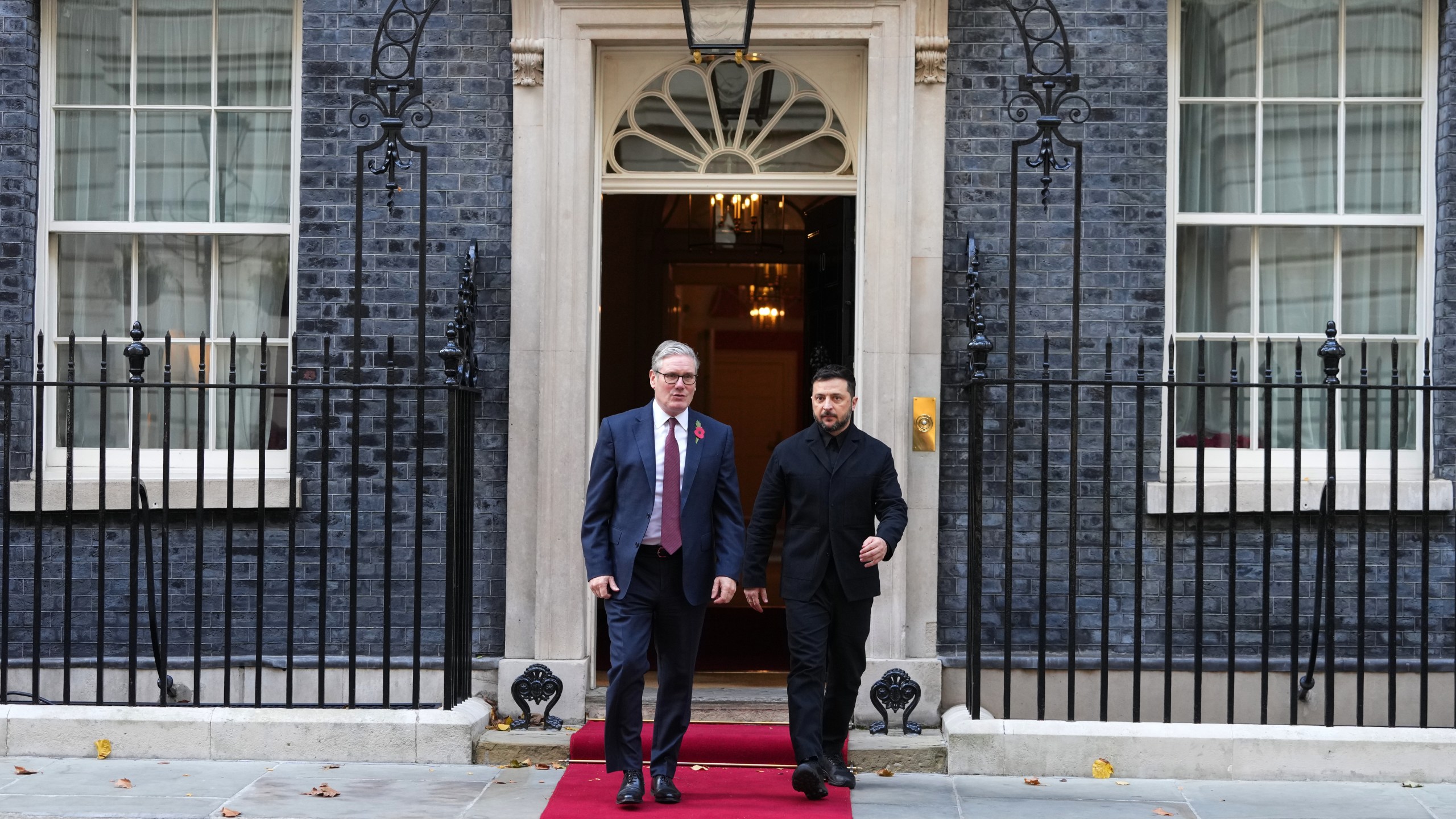 Britain's Prime Minister Keir Starmer and Ukraine's President Volodymyr Zelenskyy leave 10 Downing Street in London, Friday, Oct. 24, 2025 for a meeting of the so-called "coalition of the willing".(AP Photo/Kirsty Wigglesworth)