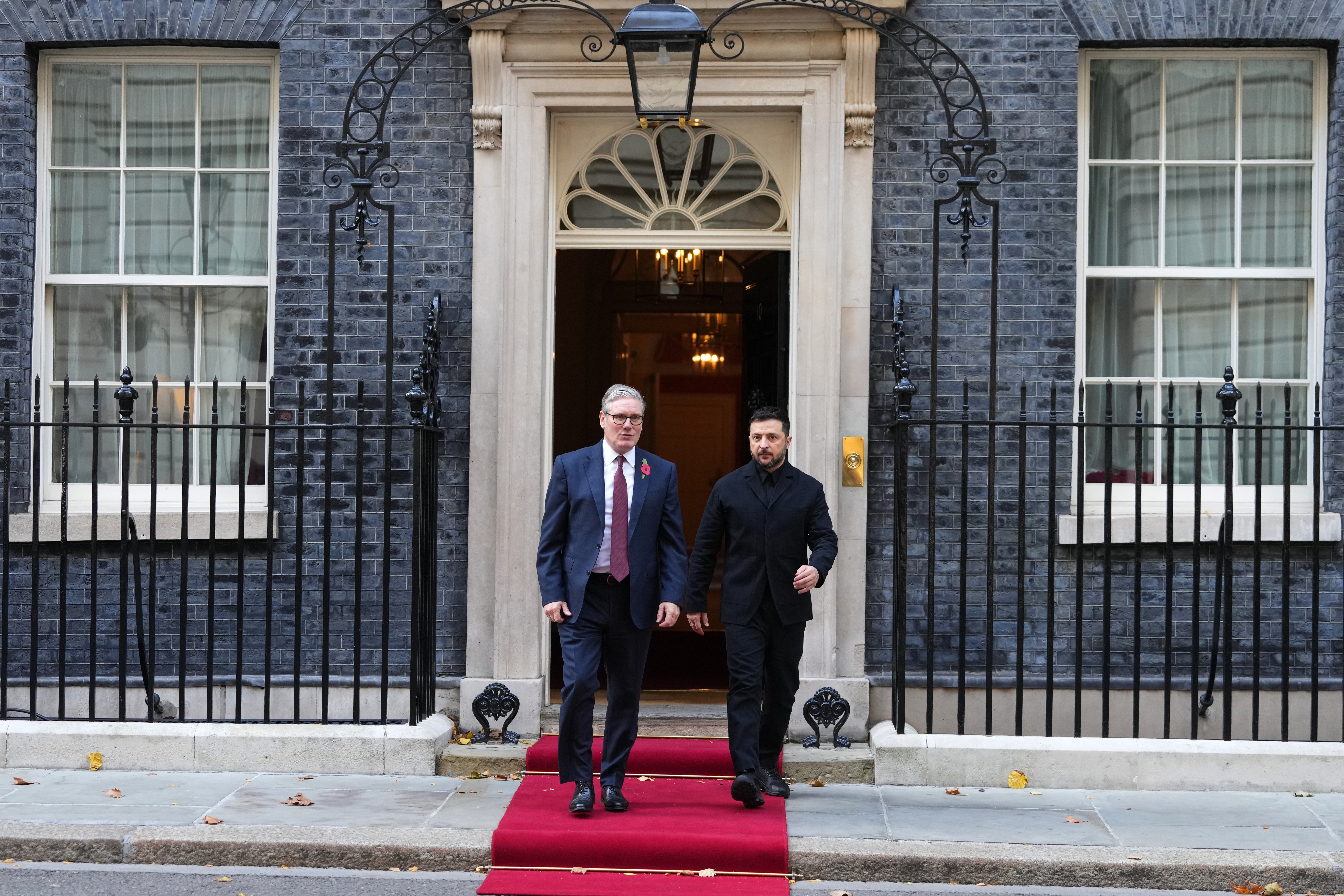 Britain's Prime Minister Keir Starmer and Ukraine's President Volodymyr Zelenskyy leave 10 Downing Street in London, Friday, Oct. 24, 2025 for a meeting of the so-called "coalition of the willing".(AP Photo/Kirsty Wigglesworth)