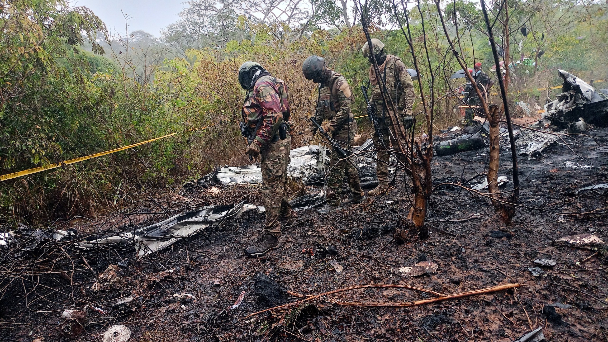 Kenyan officials inspect the scene of a plane crash near Diani, Kenya, Tuesday, Oct. 28, 2025. (AP Photo)