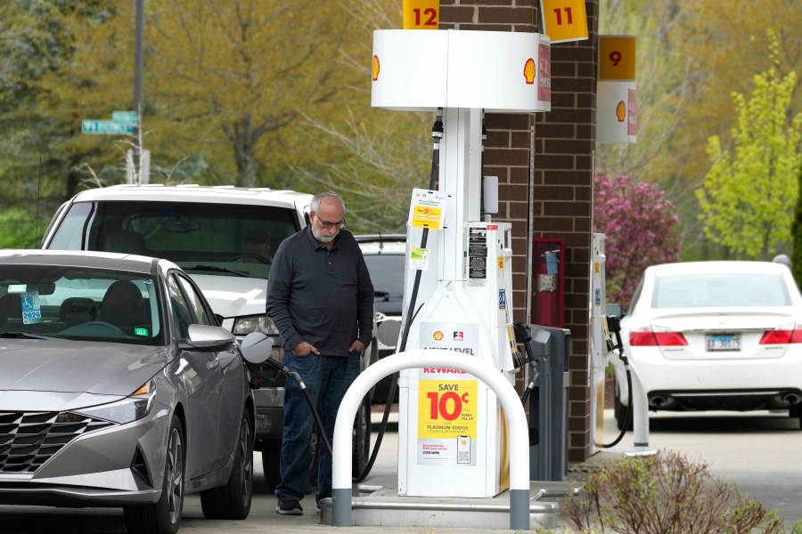 FILE - A customer fills up his vehicle's gas tank at a gas station in Buffalo Grove, Ill., April 23, 2024. (AP Photo/Nam Y. Huh, file)