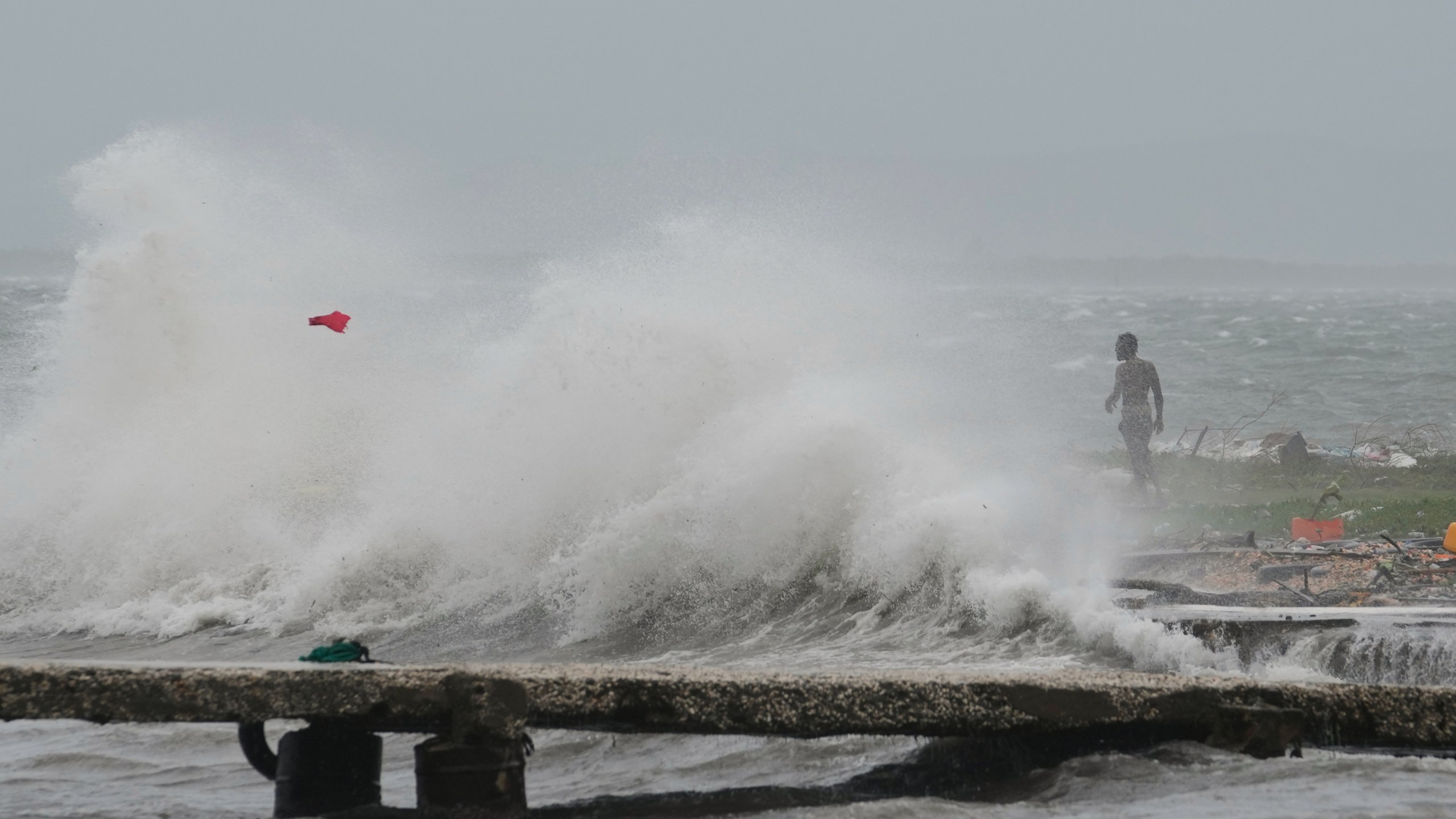 Waves splash in Kingston, Jamaica, as Hurricane Melissa approaches, Tuesday, Oct. 28, 2025. (AP Photo/Matias Delacroix)