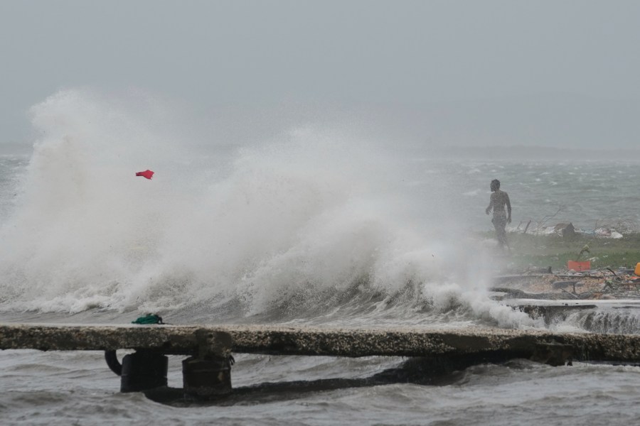 Waves splash in Kingston, Jamaica, as Hurricane Melissa approaches, Tuesday, Oct. 28, 2025. (AP Photo/Matias Delacroix)