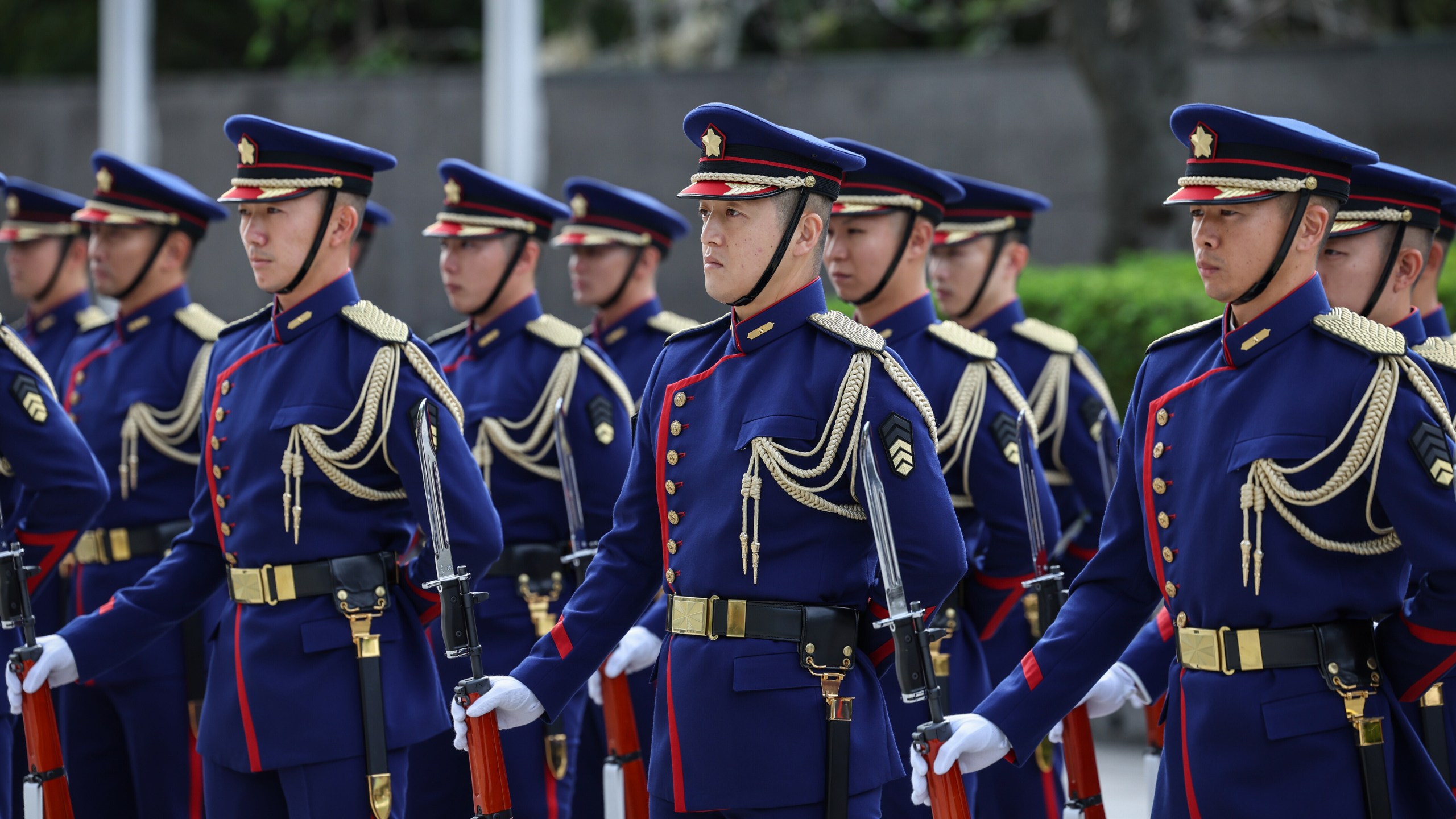 A guard of honor stands for inspection by U.S. Defense Secretary Pete Hegseth and Japan's Defense Minister Shinjiro Koizumi, both unseen, in Tokyo Wednesday, Oct. 29, 2025. (Takashi Aoyama/Pool Photo via AP)