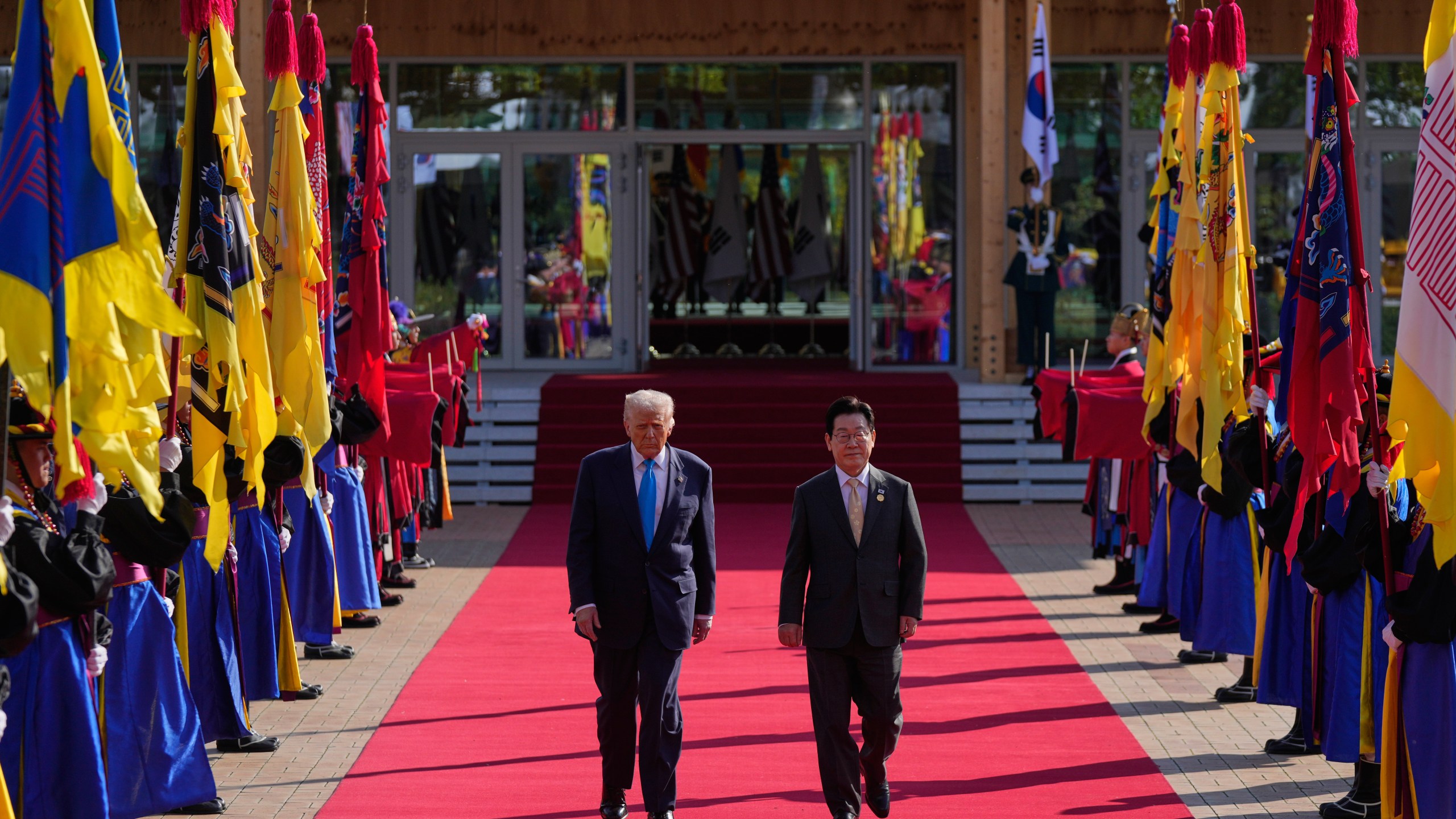 President Donald Trump and South Korean President Lee Jae Myung walk in a welcome ceremony at the Gyeongju National Museum in Gyeongju, South Korea, Wednesday, Oct. 29, 2025. (AP Photo/Mark Schiefelbein)