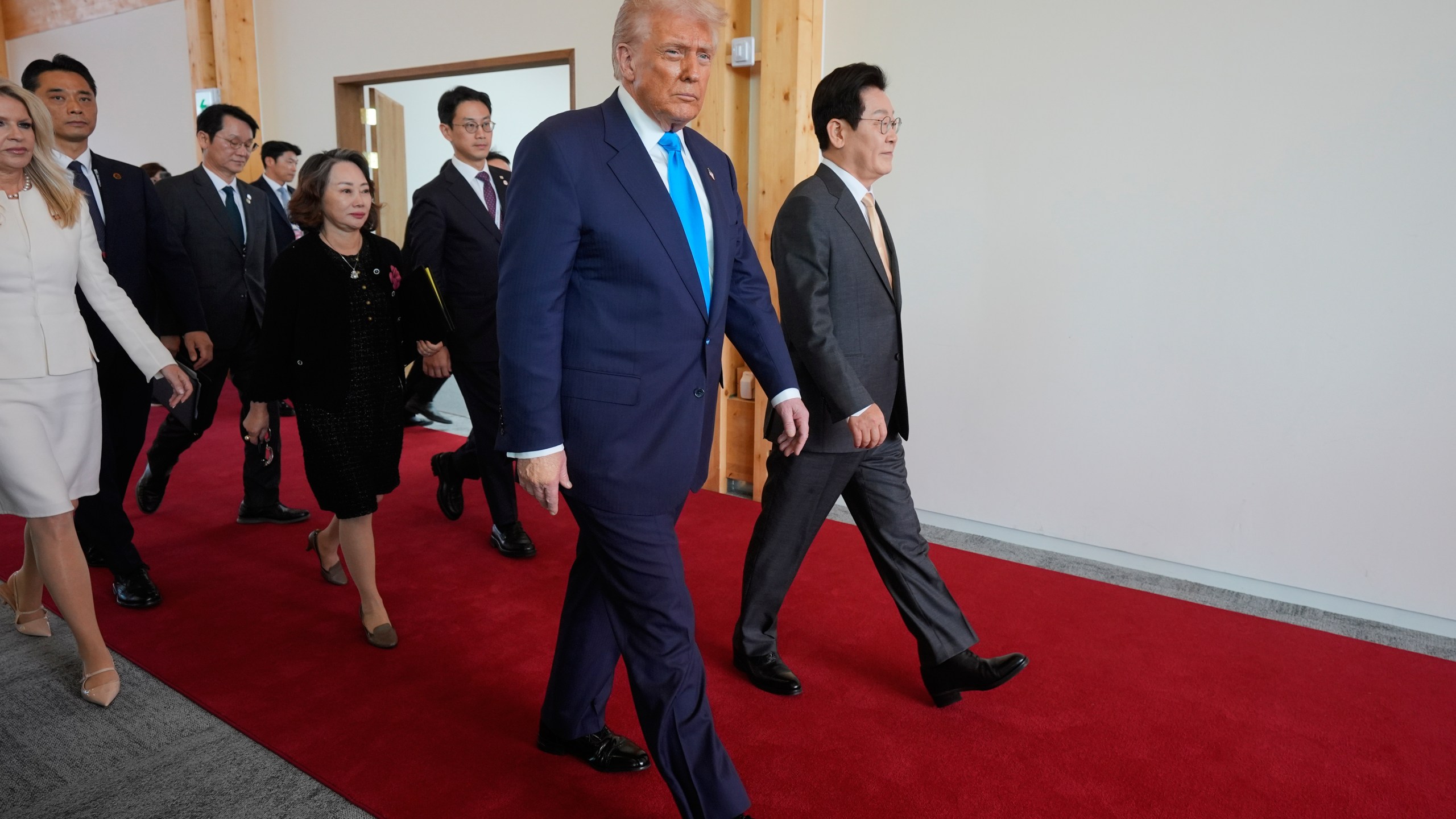 President Donald Trump, center, and South Korean President Lee Jae Myung, right, attend a high honor ceremony at the Gyeongju National Museum in Gyoeongju, South Korea, Wednesday, Oct. 29, 2025. (AP Photo/Mark Schiefelbein)