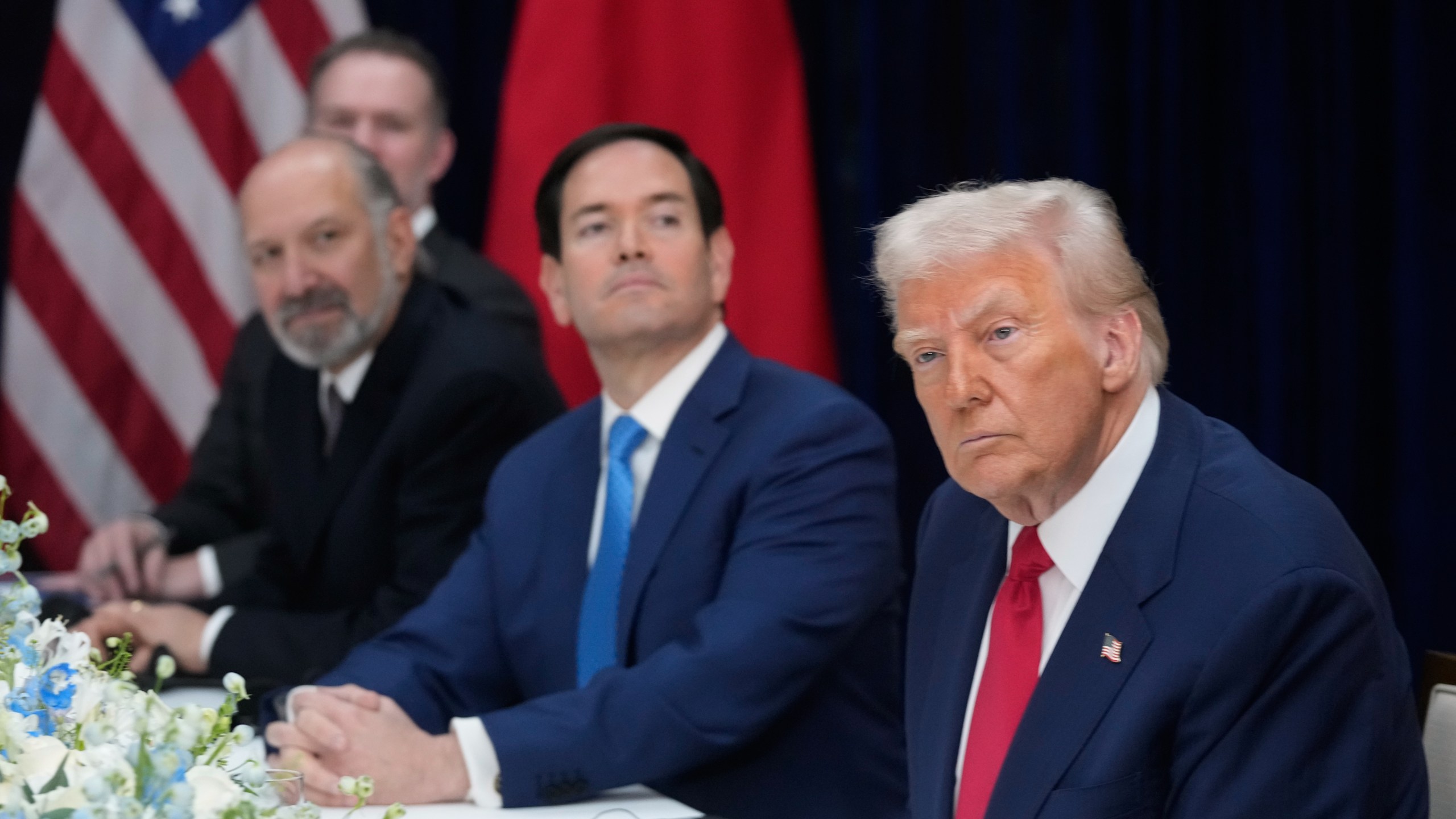 President Donald Trump, right, with Secretary of State Marco Rubio, second right, and Commerce Secretary Howard Lutnick, third right, meets with Chinese President Xi Jinping at Gimhae International Airport in Busan, South Korea, Thursday, Oct. 30, 2025. (AP Photo/Mark Schiefelbein)