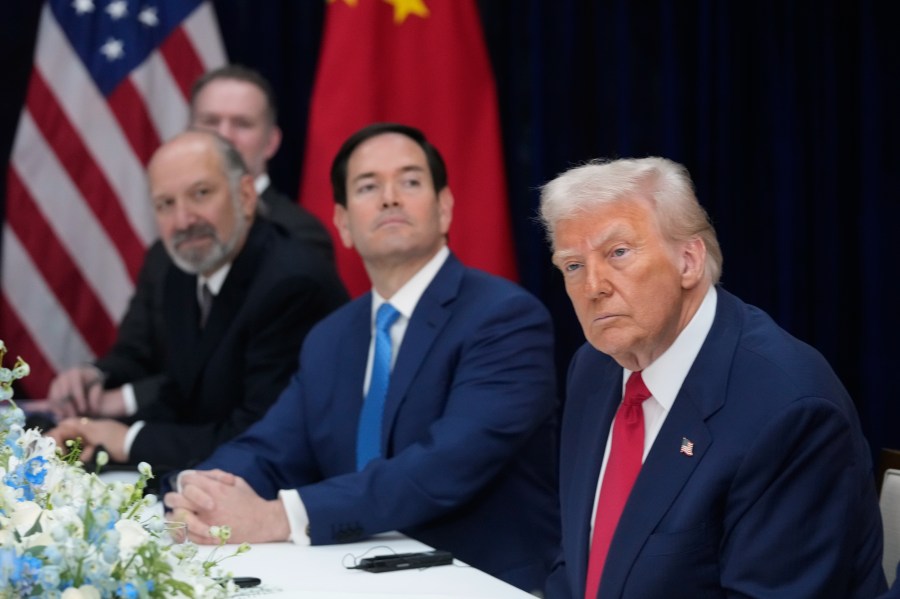 President Donald Trump, right, with Secretary of State Marco Rubio, second right, and Commerce Secretary Howard Lutnick, third right, meets with Chinese President Xi Jinping at Gimhae International Airport in Busan, South Korea, Thursday, Oct. 30, 2025. (AP Photo/Mark Schiefelbein)