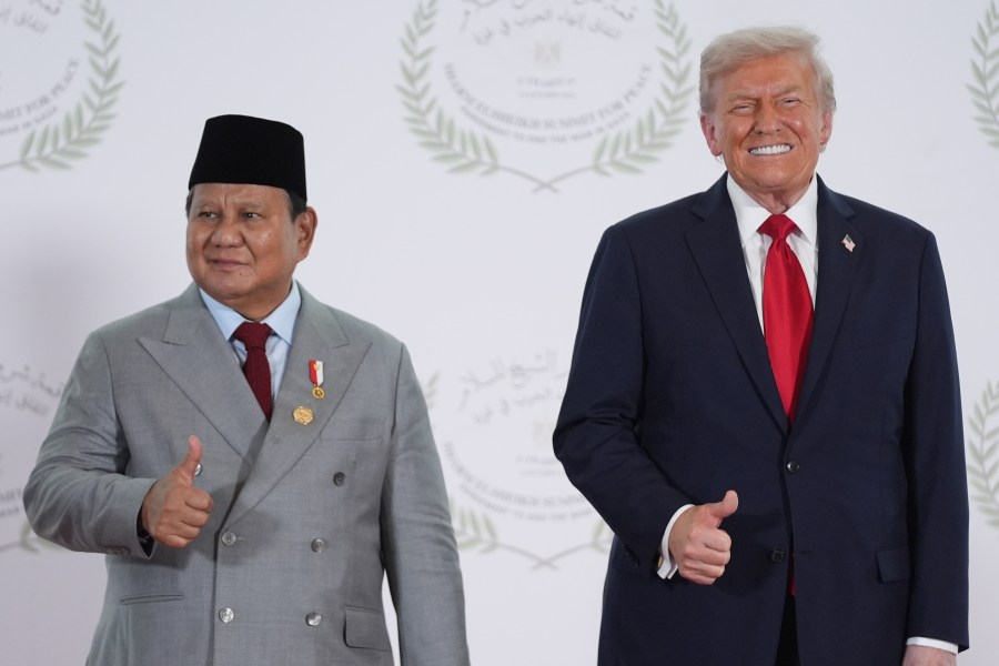President Donald Trump greets Indonesia's President Prabowo Subianto during a summit to support ending the more than two-year Israel-Hamas war in Gaza after a breakthrough ceasefire deal, Monday, Oct. 13, 2025, in Sharm El Sheikh, Egypt. (AP Photo/Evan Vucci, Pool)
