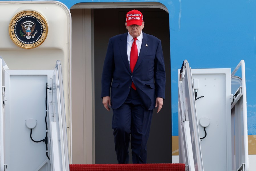 President Donald Trump walks down the stairs of Air Force One upon his arrival at Joint Base Andrews, Md., Thursday, Oct. 30, 2025, after returning from Asia. (AP Photo/Luis M. Alvarez)