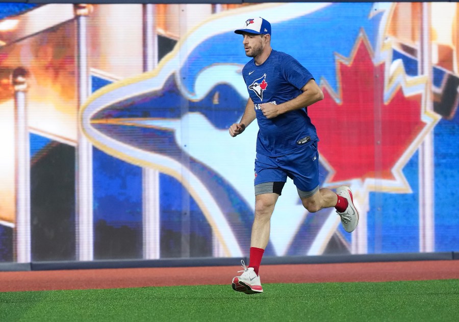 Toronto Blue Jays pitcher Max Scherzer warms up during practice ahead of game 6 of the World Series against the Los Angeles Dodgers in Toronto on Thursday, Oct. 30, 2025. (Nathan Denette/The Canadian Press via AP)