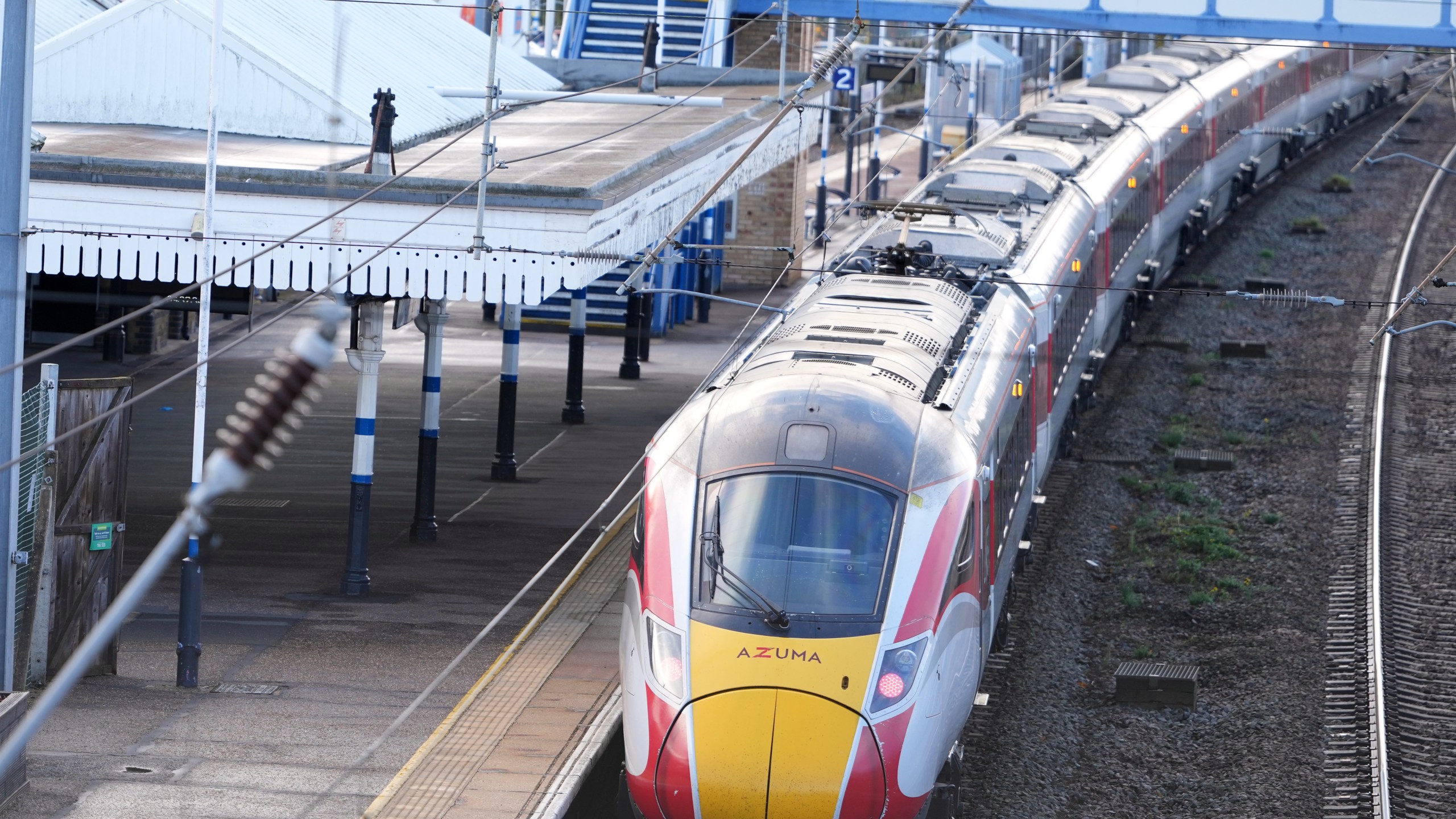 A train is parked at the station after a mass stabbing on a London-bound train in Huntingdon, England, Sunday, Nov. 2, 2025.(AP Photo/Kirsty Wigglesworth)