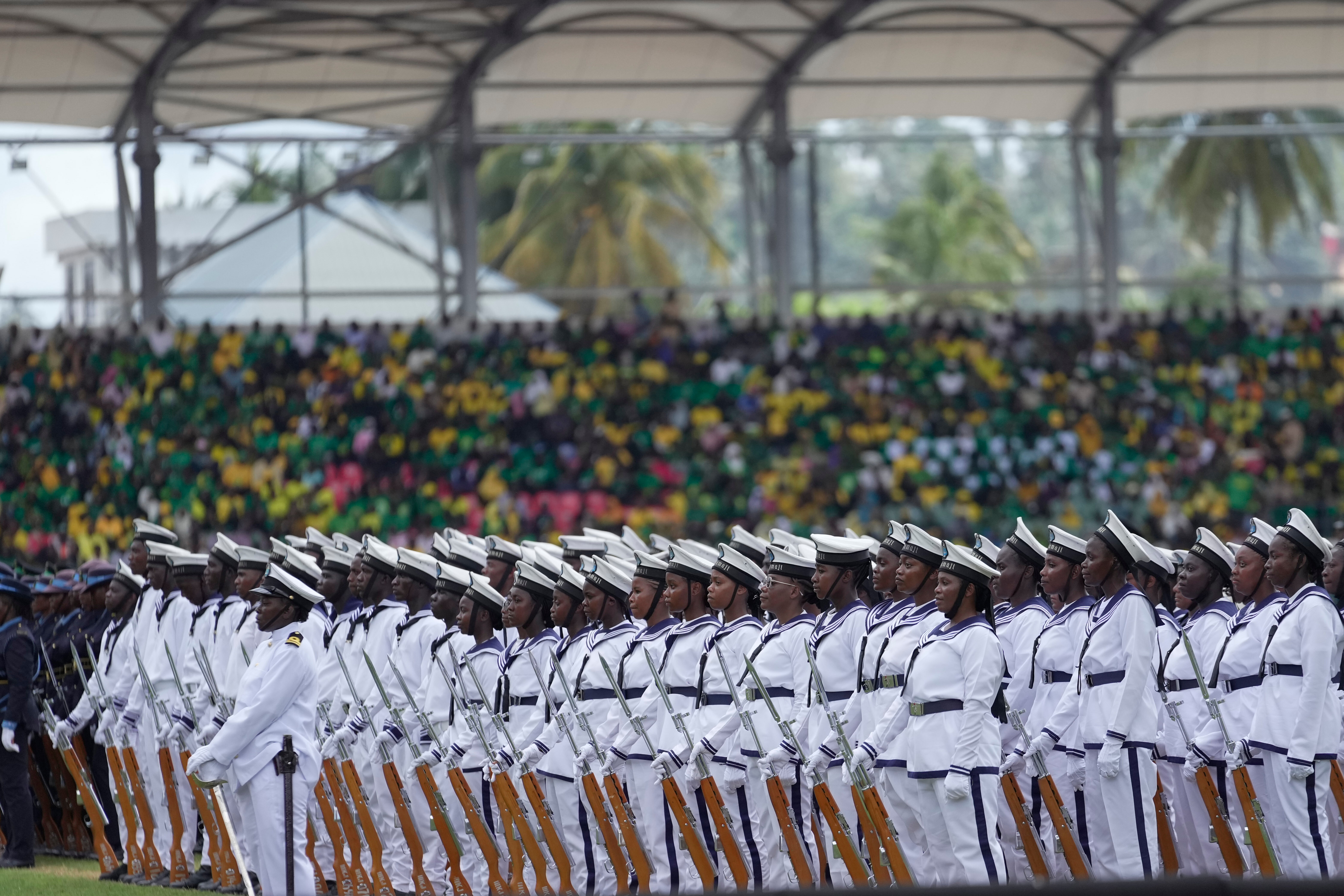 Tanzania Navy soldiers march in formation during the inauguration of Zanzibar President elect Hussein Ali Mwinyi of the ruling Chama Cha Mapinduzi (Revolutionary Party) at Amman Stadium in Zanzibar, Tanzania, Saturday, Nov. 1, 2025. (AP Photo/Brian Inganga)