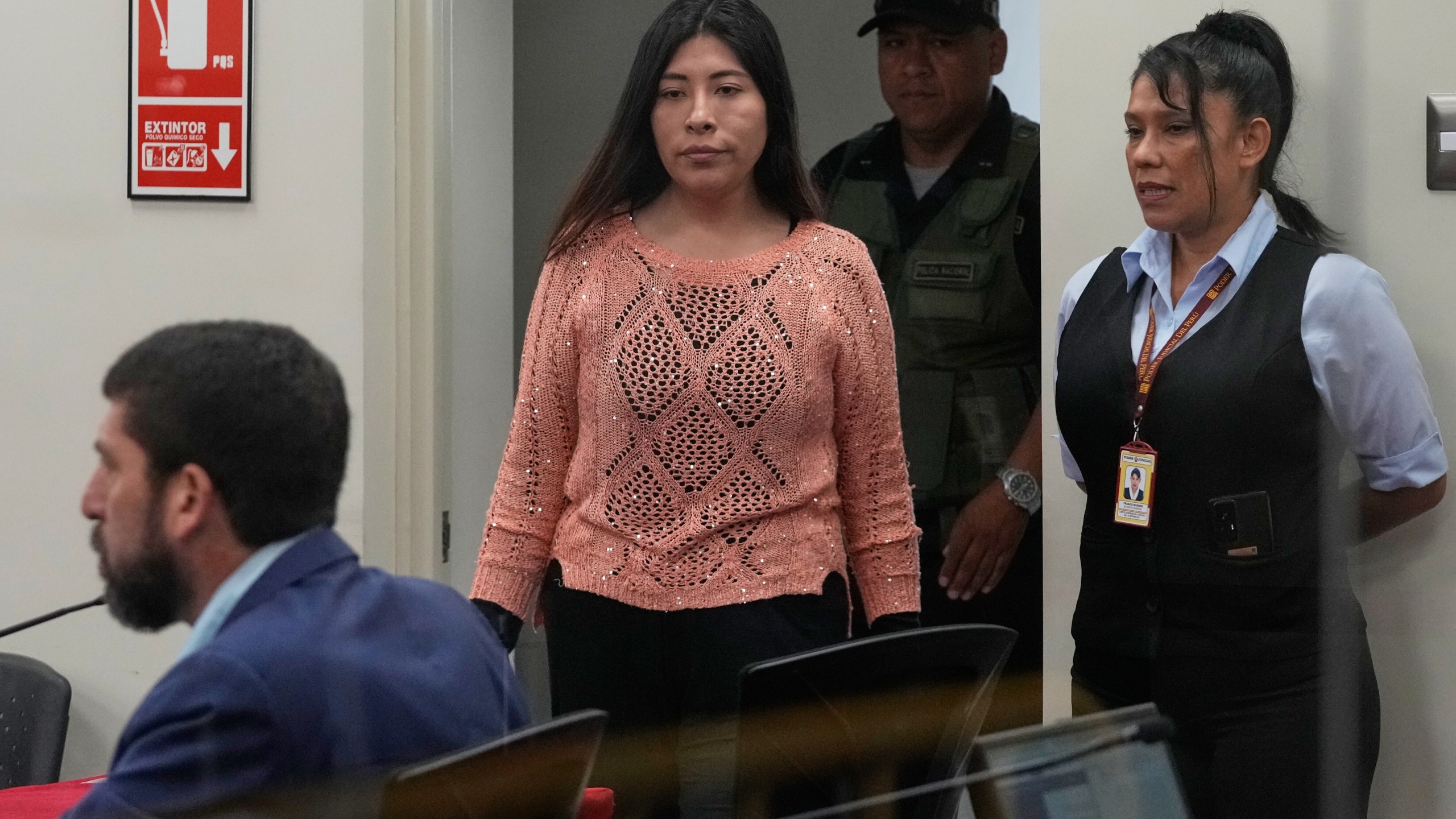 Peruvian former Prime Minister Betssy Chavez arrives for her trial on charges of rebellion and conspiracy against the state at a police base on the outskirts of Lima, Peru, Tuesday, March 18, 2025. (AP Photo/Martin Mejia)