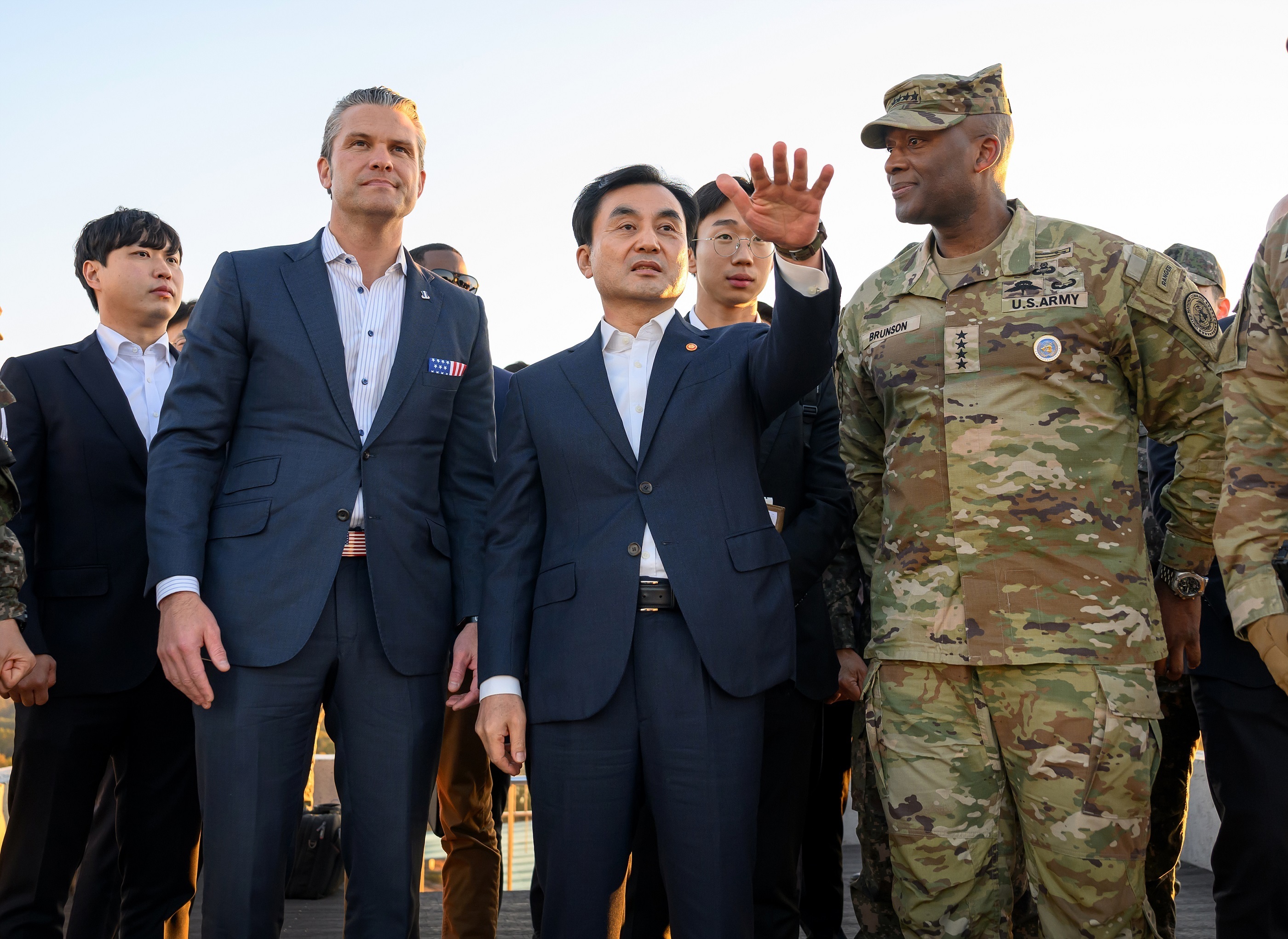 In this photo provided by the South Korea Defense Ministry, U.S. Defense Secretary Pete Hegseth, second from left, and South Korean Defense Minister Ahn Gyu-back, center, visit the Observation Post Ouellette near the border village of Panmunjom, South Korea, Monday, Nov. 3, 2025. (South Korea Defense Ministry via AP)