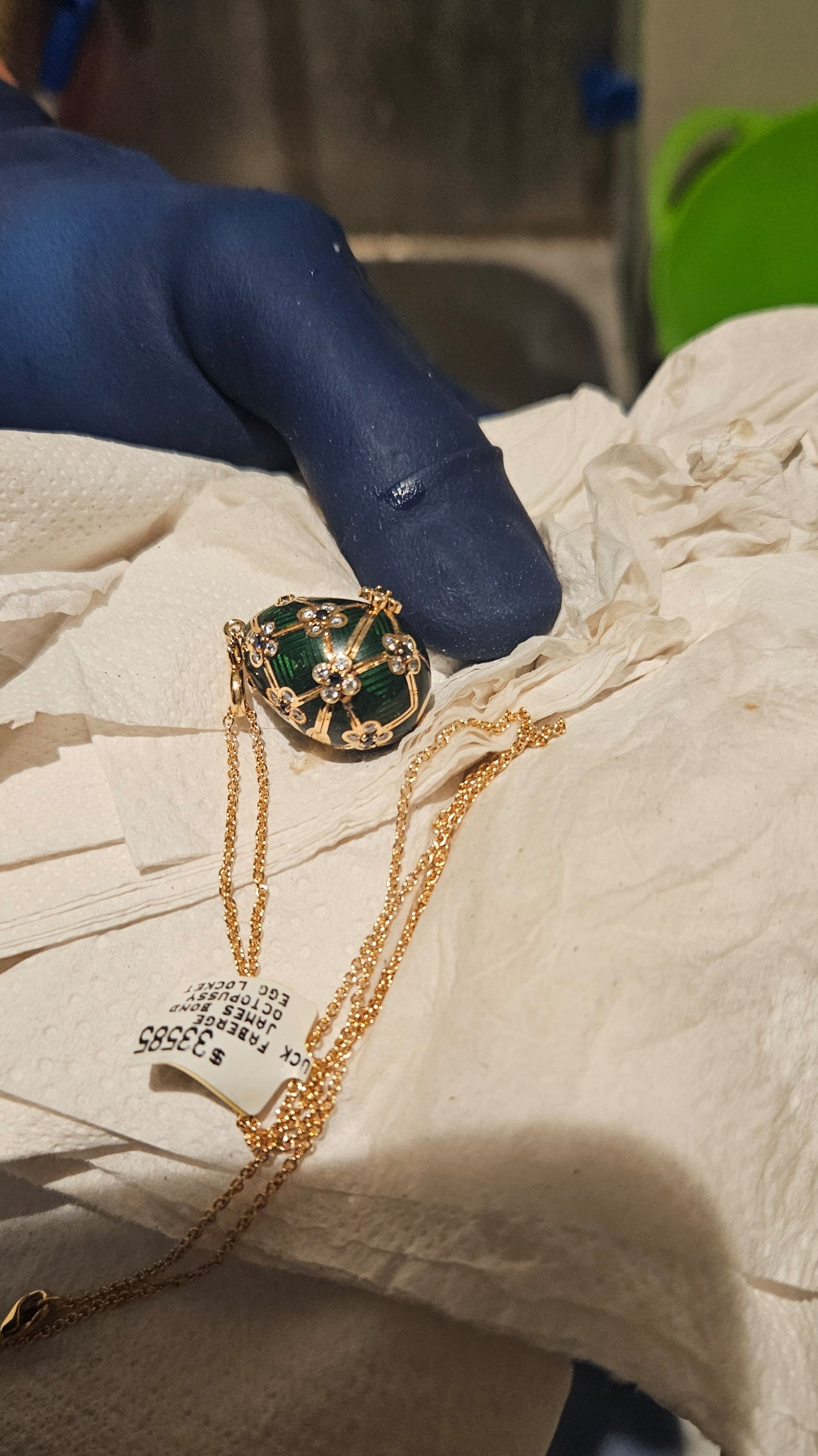 In this photo provided by the New Zealand Police a Fabergé pendant is held after it was recovered, Thursday, Dec. 4, 2025, from a man accused of stealing and swallowing the pendant. (New Zealand Police via AP)