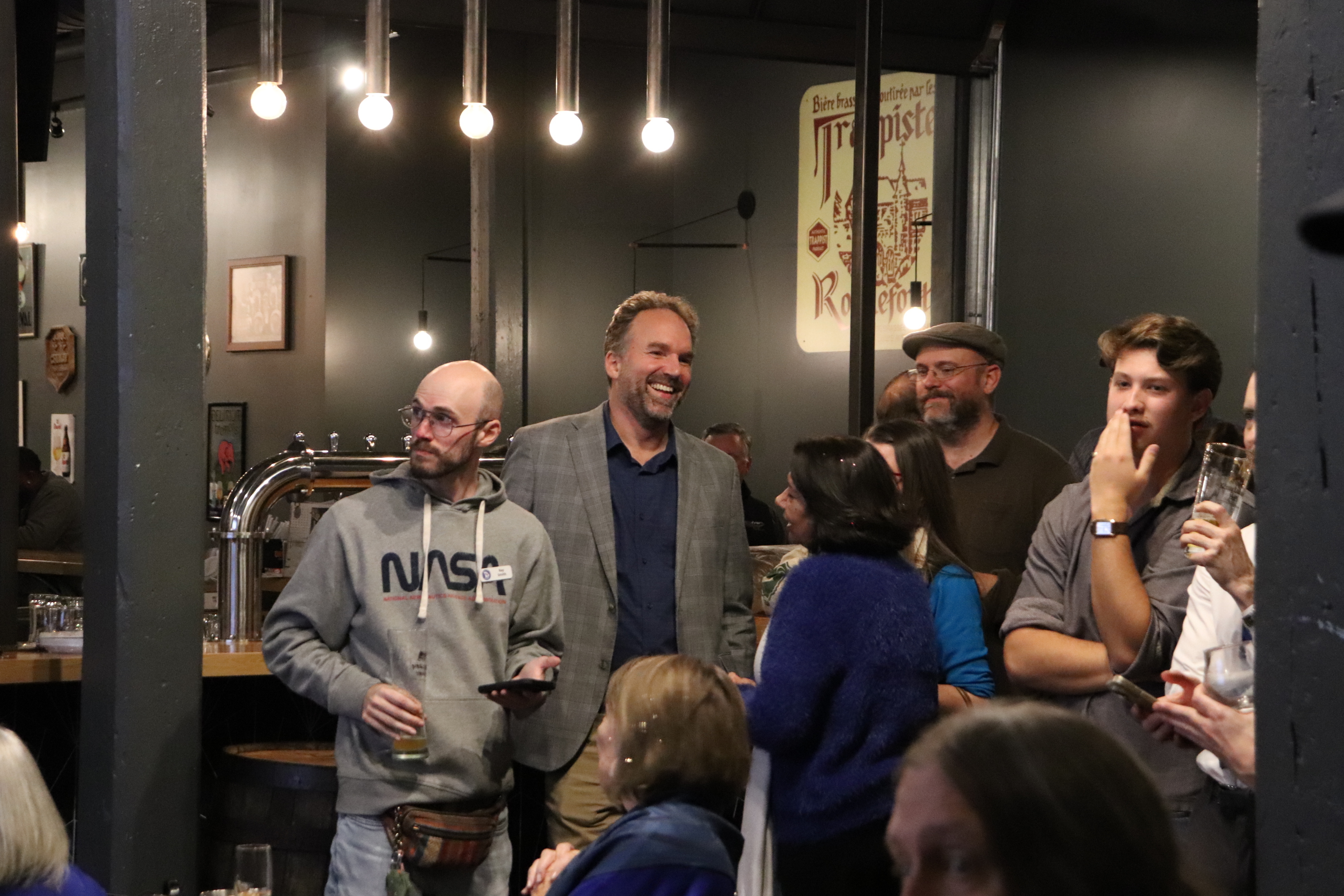 Democrat Eric Gisler talks to supporters about his election victory in a Georgia state House race on Tuesday, Dec. 9, 2025 at the Trappeze Pub in Athens, Ga. (Christopher Dowd/Athens Political Nerd via AP)