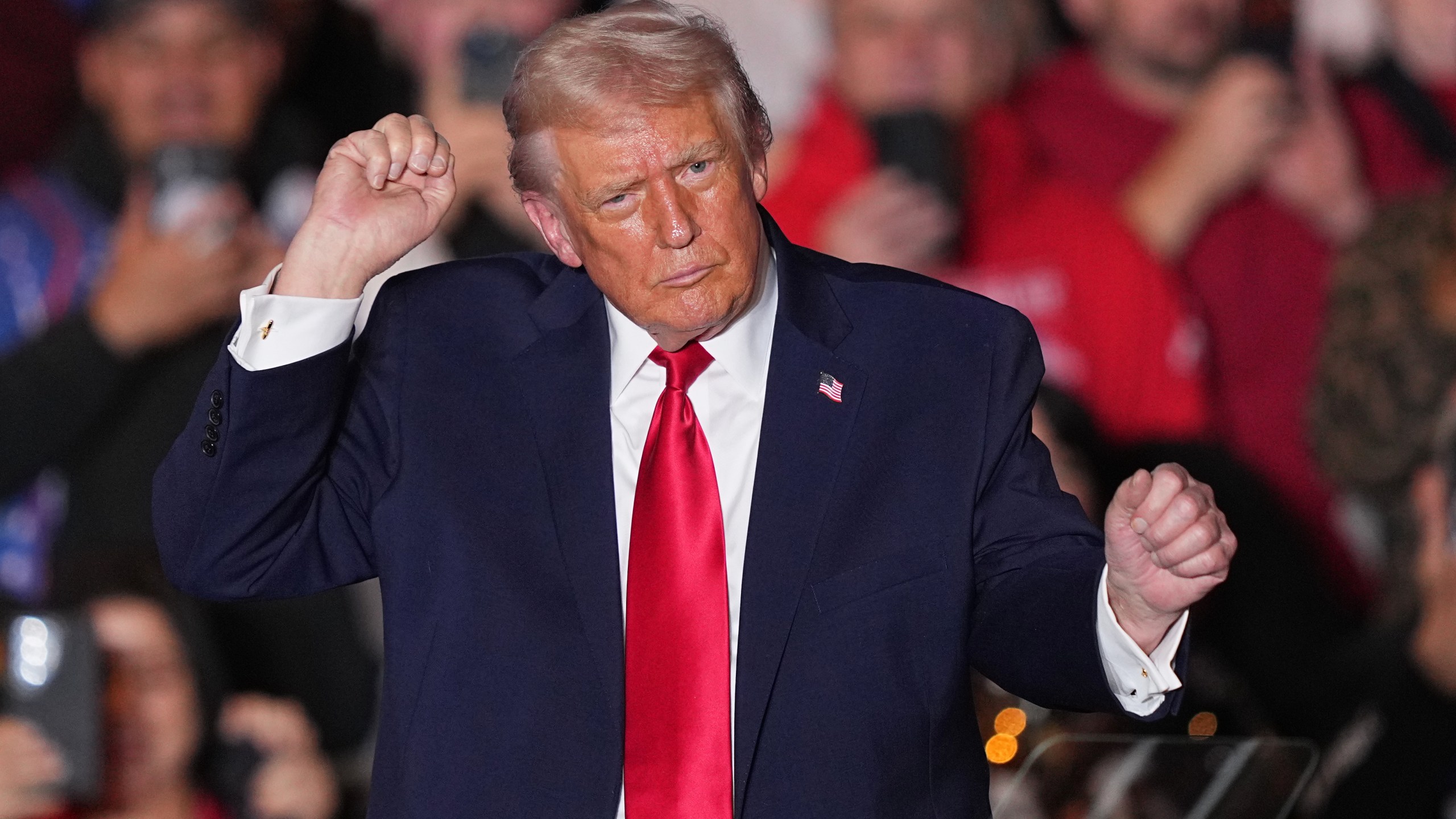 President Donald Trump dances to music after speaking at the Mount Airy Casino Resort in Mount Pocono, Pa., Tuesday, Dec. 9, 2025. (AP Photo/Matt Rourke)