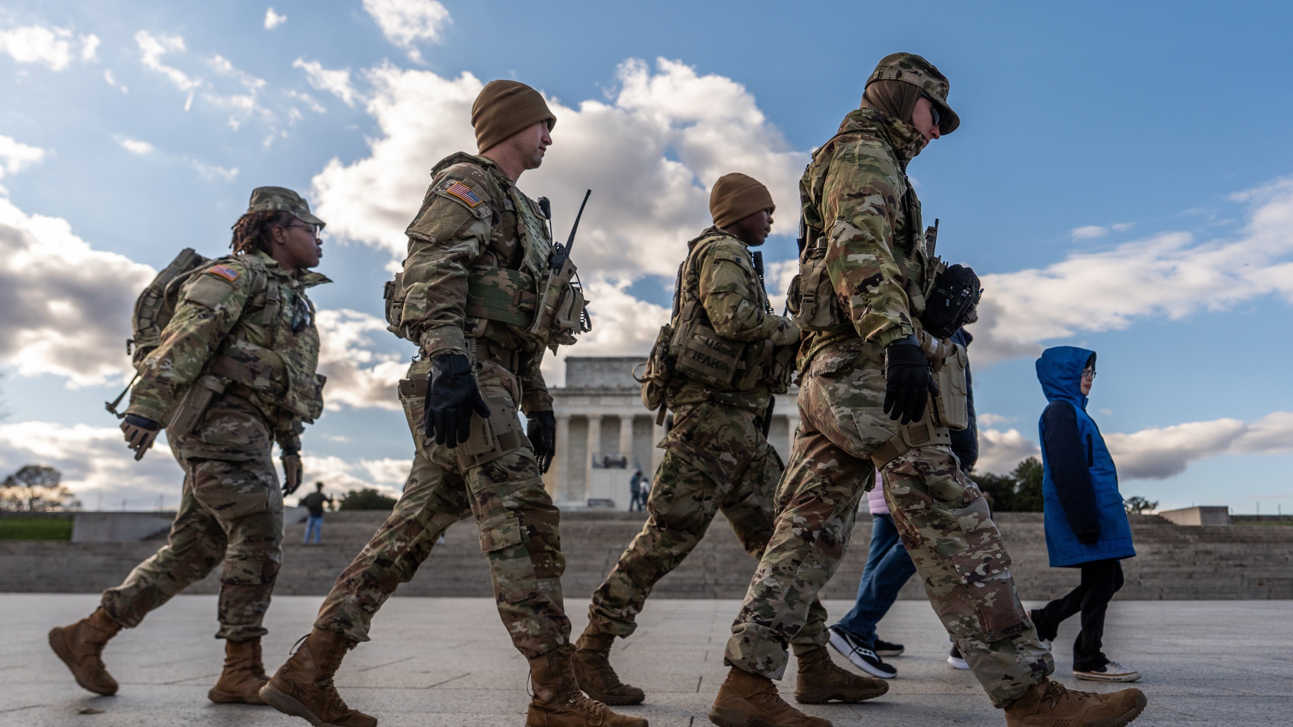 Members of the National Guard patrol in front of the Lincoln Memorial on the National Mall, Friday, Nov. 28, 2025, in Washington. (AP Photo/Julia Demaree Nikhinson)