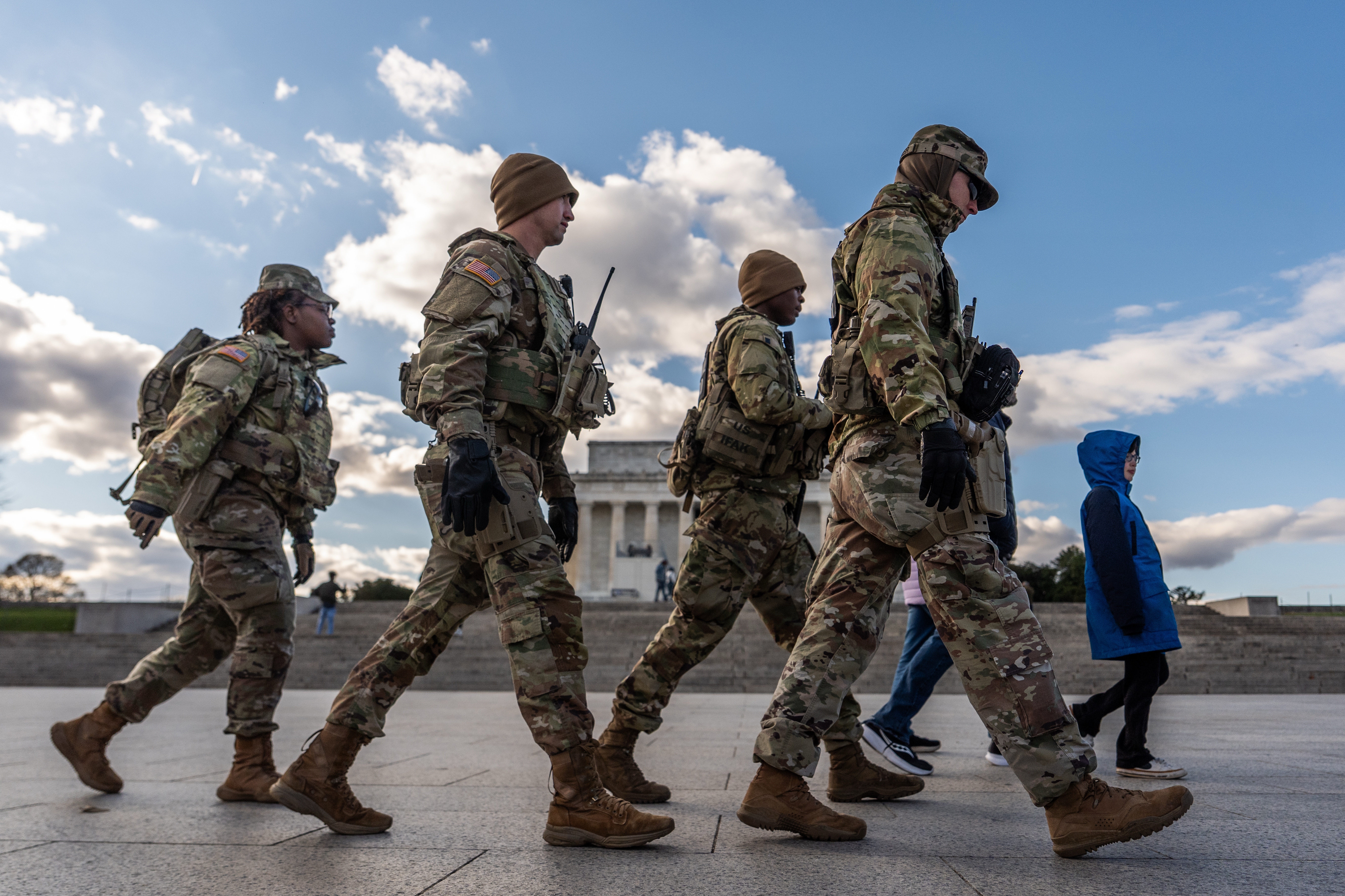 Members of the National Guard patrol in front of the Lincoln Memorial on the National Mall, Friday, Nov. 28, 2025, in Washington. (AP Photo/Julia Demaree Nikhinson)