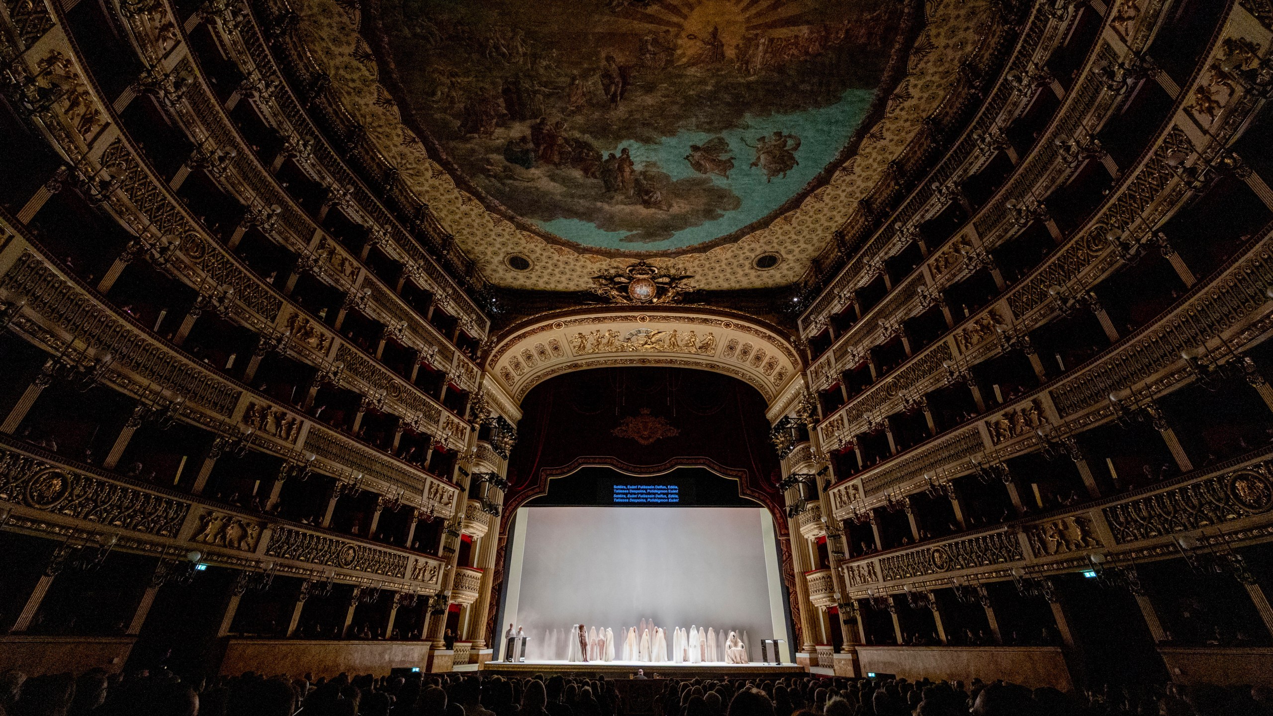 Actors perform during the general rehearsal of Ennio Morricone's only opera, Partenope, at the San Carlo Theatre, in Naples, Italy, Thursday, Dec. 11, 2025. (AP Photo/Salvatore Laporta)